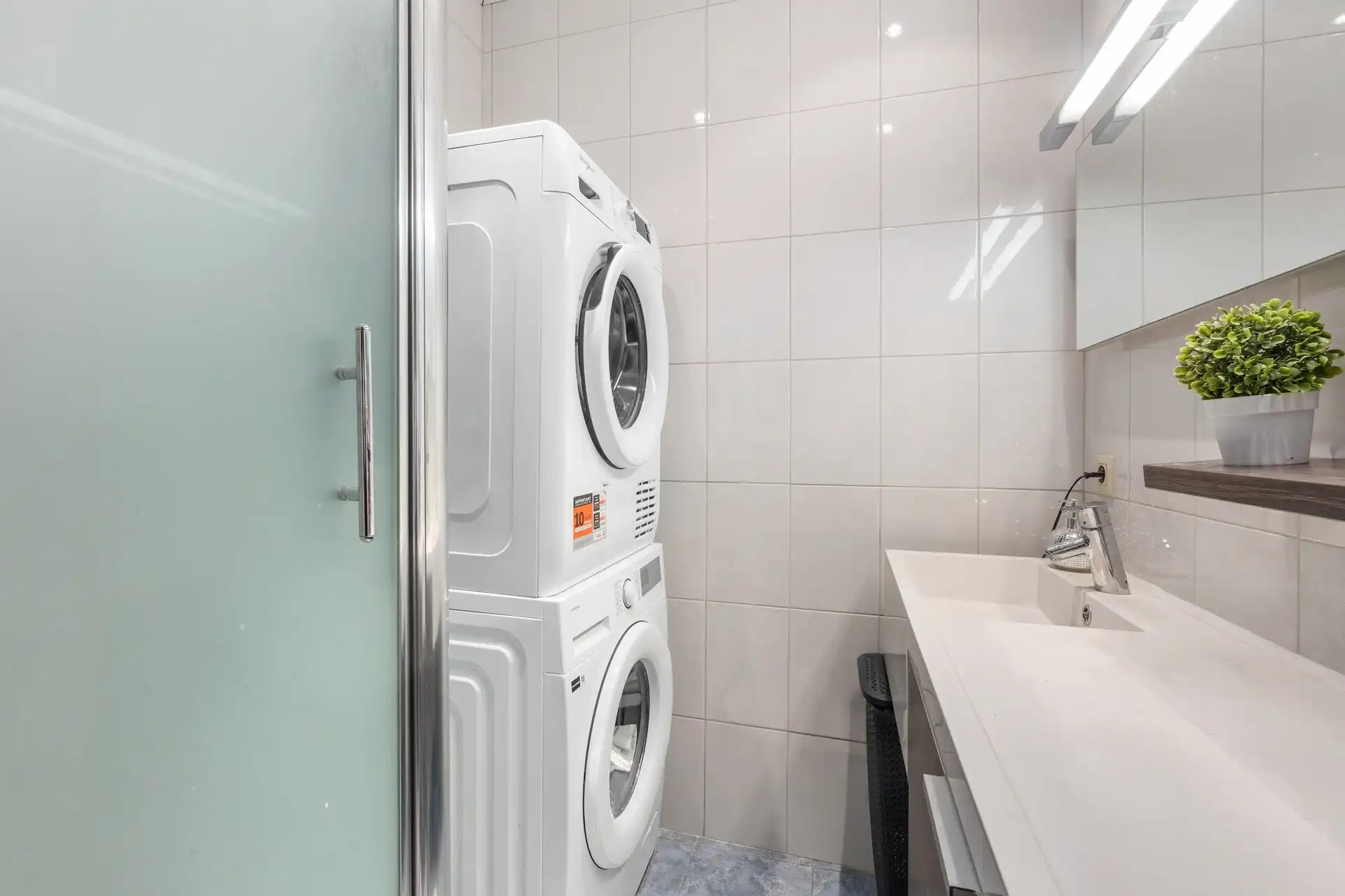 Appartement centraal gelegen met ondergrondse staanplaats foto 6