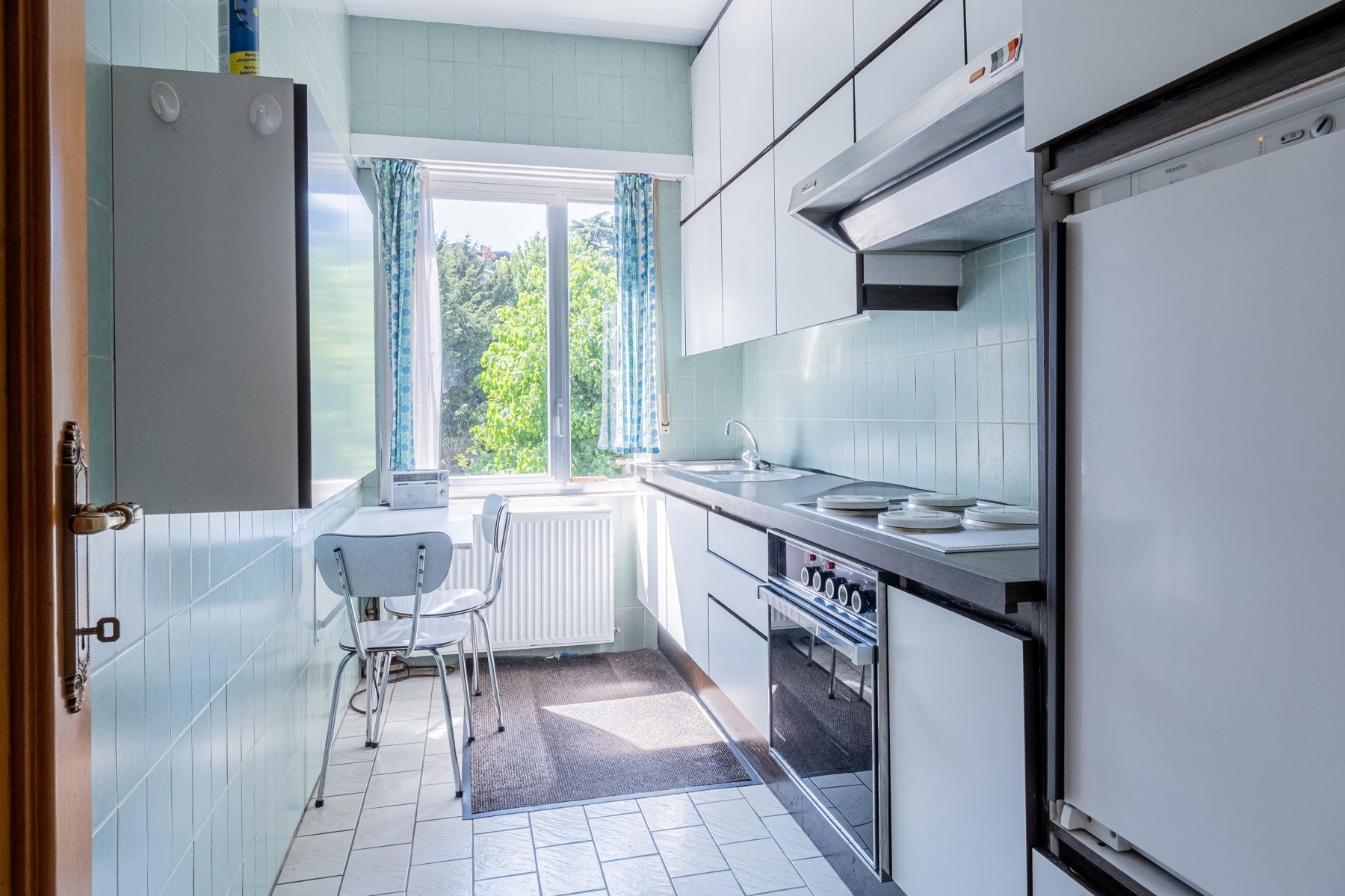 Woning met potentieel én grote tuin vlak bij het Rivierenhof foto 8