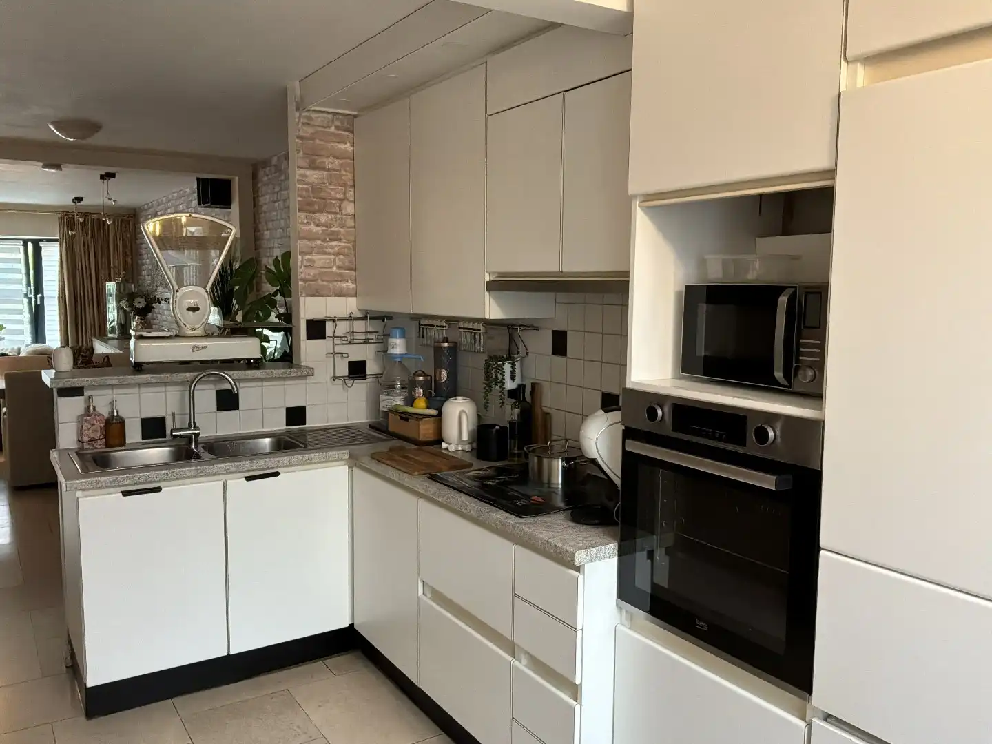 Instapklaar duplex appartement met terras en tuintje in het centrum – geen gemeenschappelijke kosten foto 3