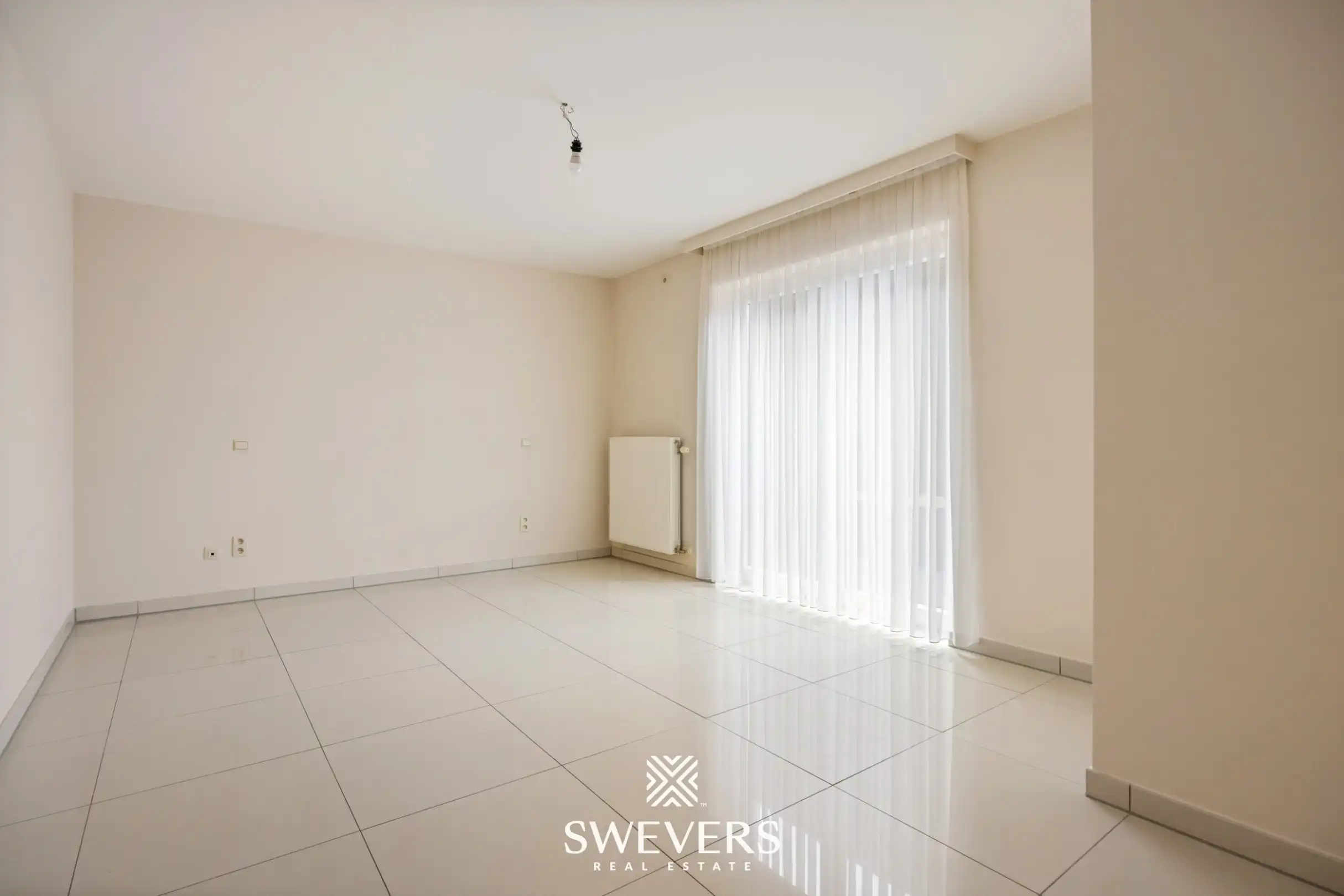 Uitstekend gelegen gelijkvloers appartement met 2 slaapkamers en private tuin foto 11