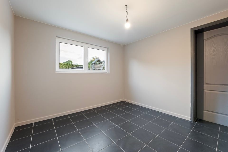 RUIME, INSTAPKLARE WONING MET 4 SLAAPKAMERS EN EEN ZONNIGE TUIN TE HEERS foto 13