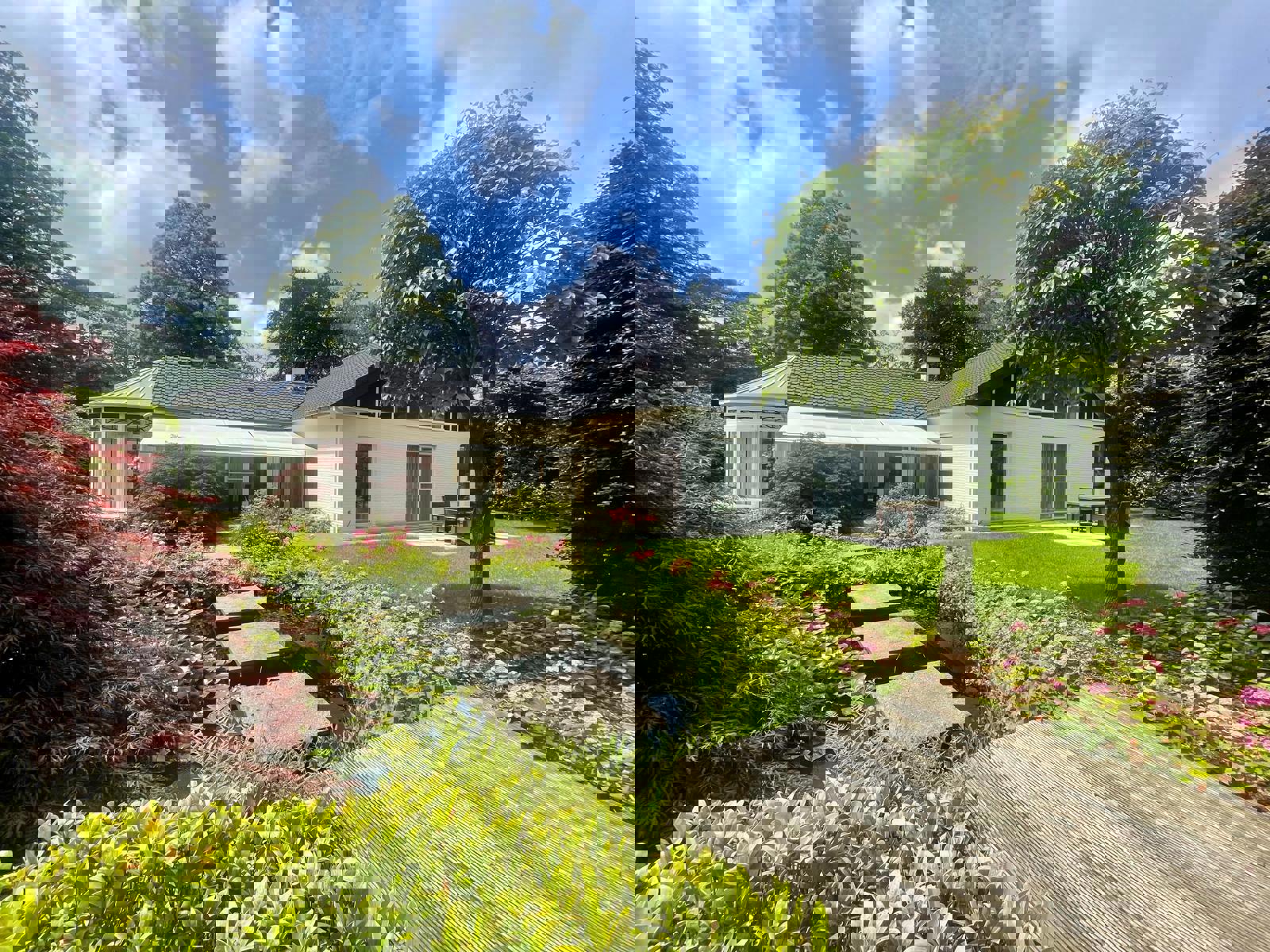 Gelijkvloerse fraaie villa met prachtige tuin op ca 1700m² foto 28