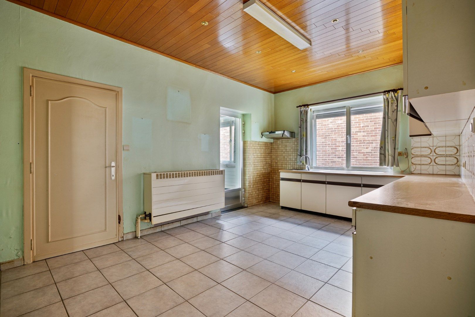 Rijwoning met grote tuin en 3 slaapkamers foto 9