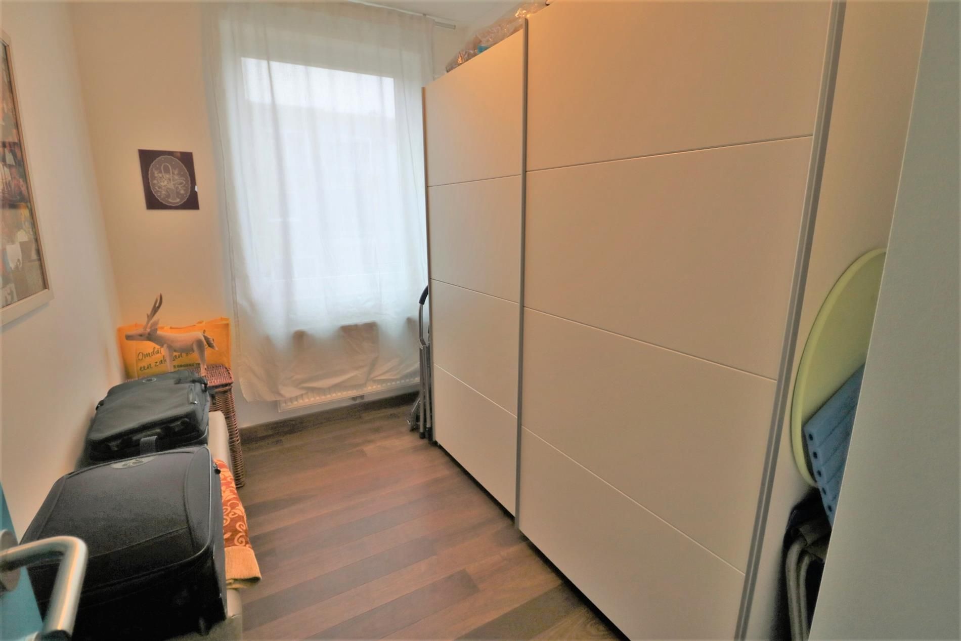 Luxueus 2-slaapkamer appartement met zonneterrassen en prachtig open zicht op de Spuikom te Bredene! foto 14