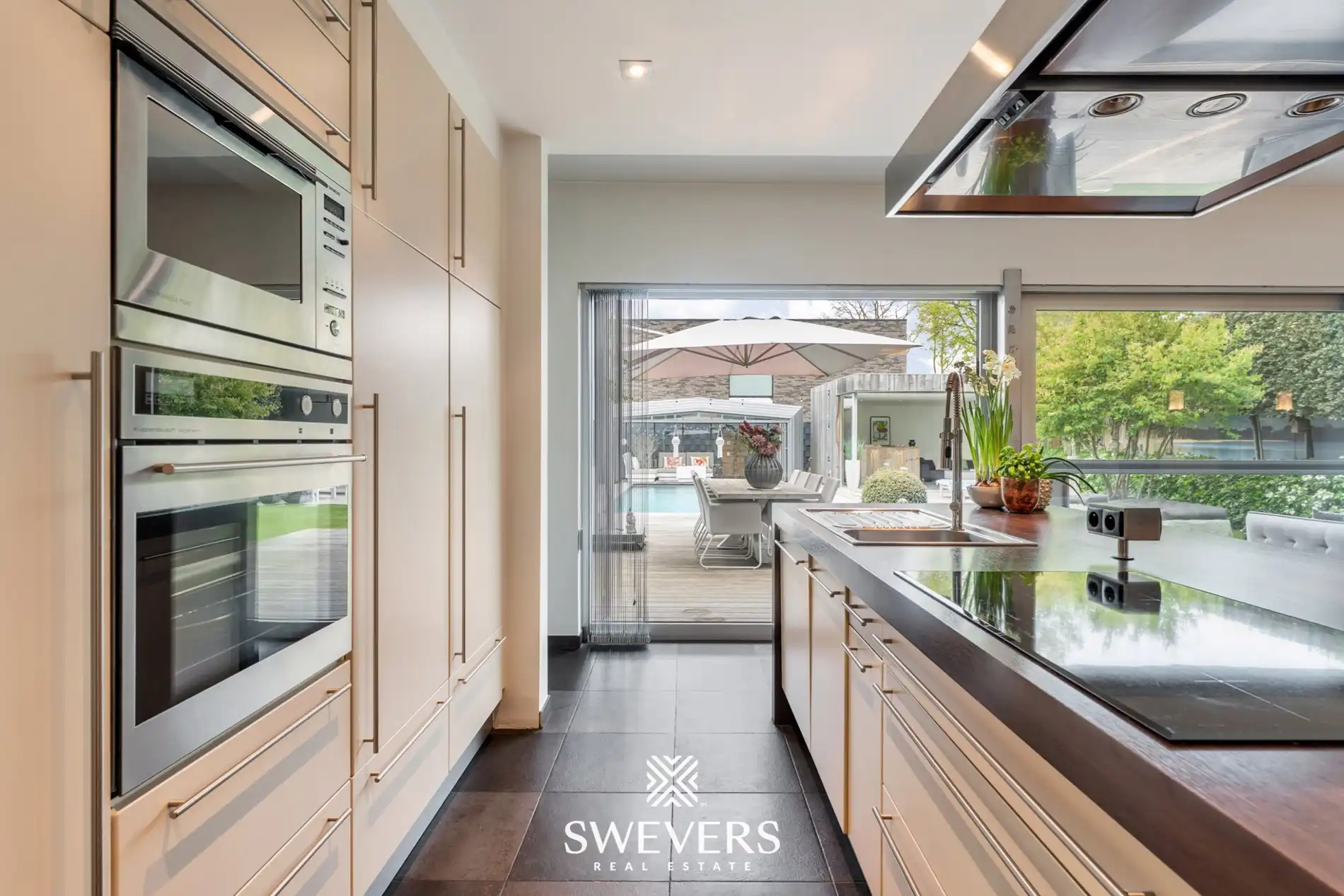 Werken, wonen en genieten in luxevilla met zwembad, poolhouse en magazijn in Koersel foto 11