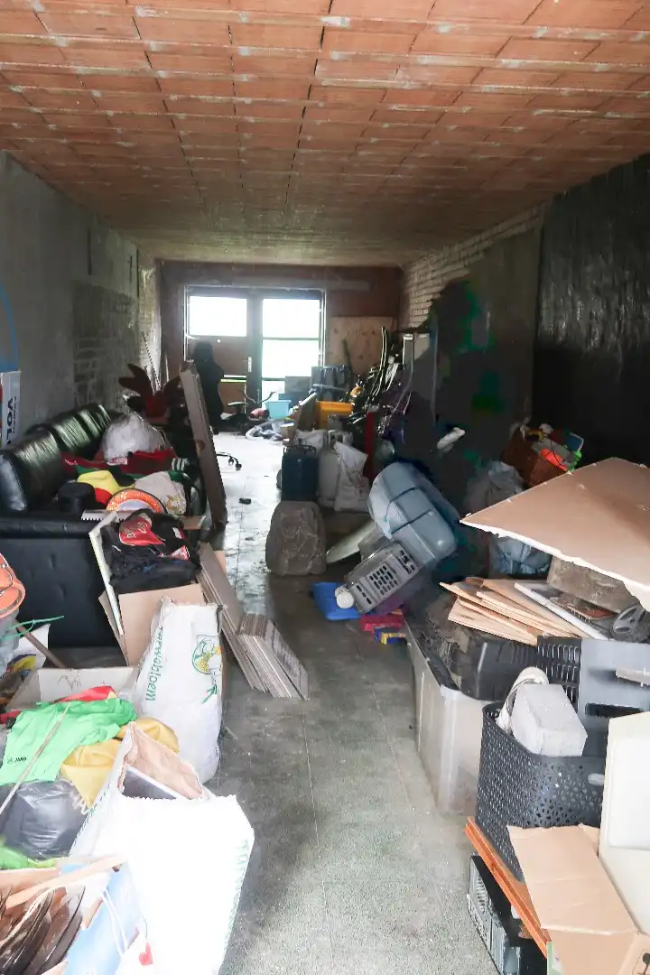 Te renoveren handelspand met woonst op topligging in De Haan foto 23