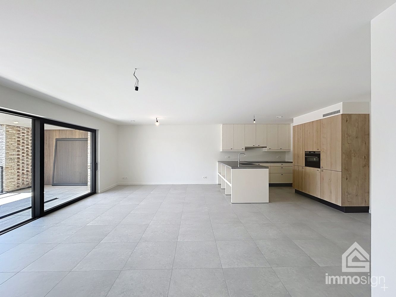 Instapklaar nieuwbouwappartement met 2 slaapkamers, terras en autostaanplaats te Kinrooi foto 3