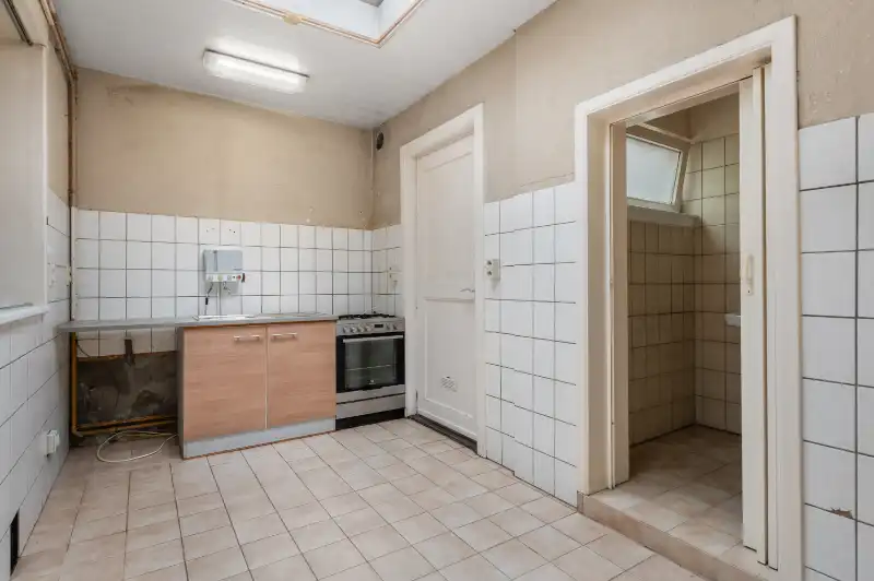 Te renoveren starterswoning met 2/3 slaapkamers en tuinjte foto 7
