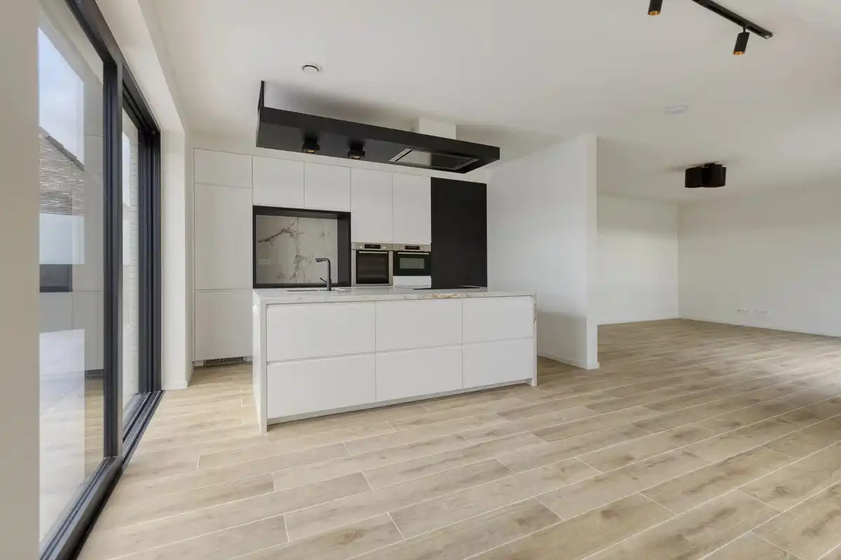 EXCLUSIEF EN KWALITATIEF NIEUWBOUWAPPARTEMENT VAN 163 M² MET 3 SLPK'S, 2 BADK'S EN RIANTE TERRASSEN IN MUNSTERBILZEN foto 10