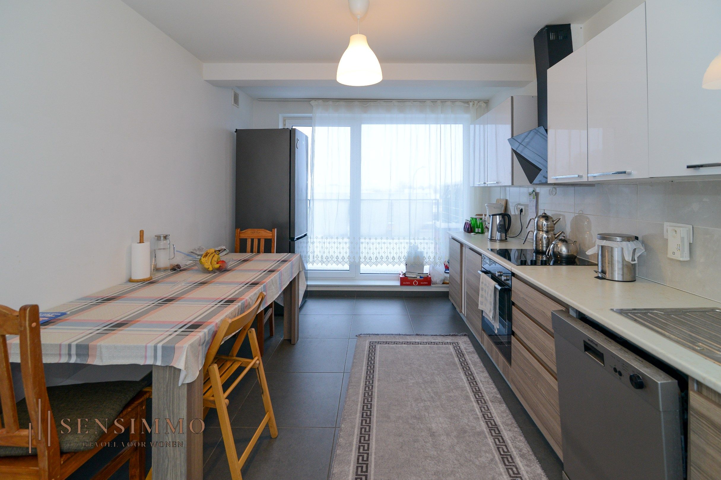 Tweeslaapkamer appartement met dubbel terras, parking en kelderberging foto 9