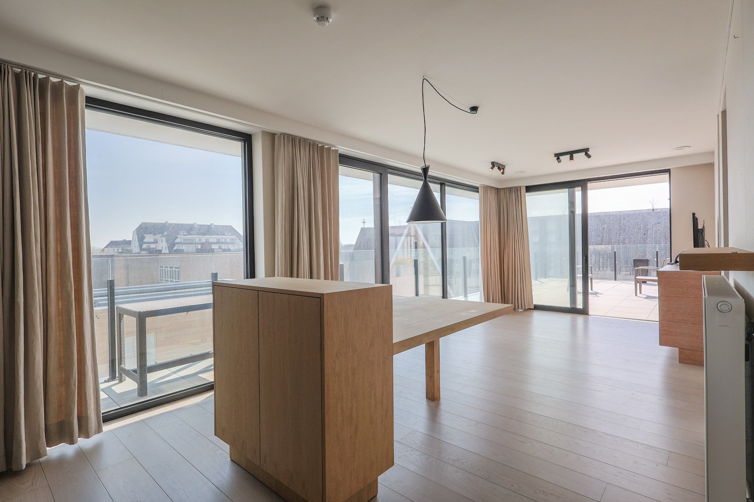 Verhuurde assistentiewoning met uitzonderlijk ruim zonneterras van 64,5m² in Oostduinkerke! foto 2