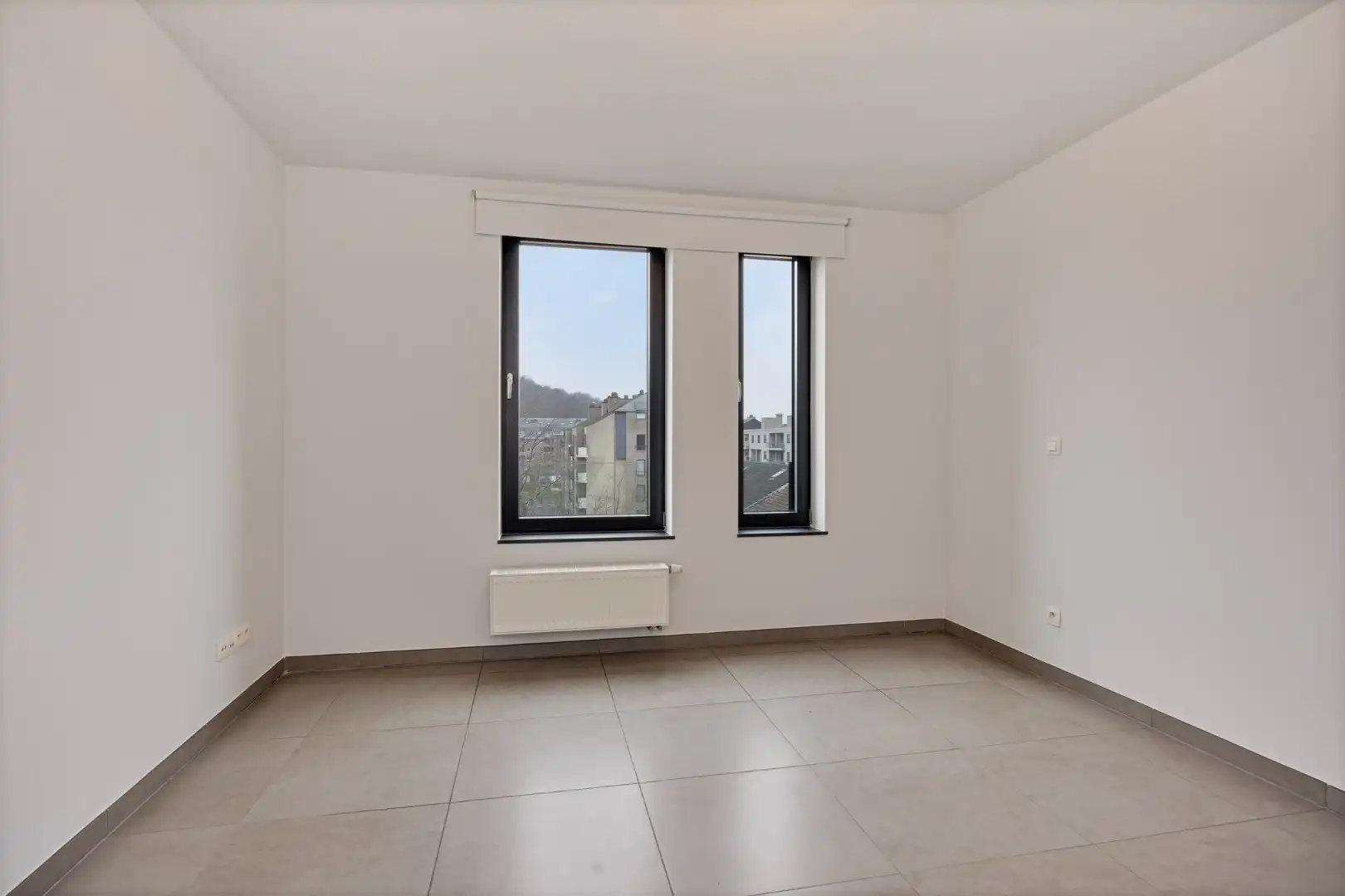 Ruim en lichtrijk appartement met 2 slaapkamers, terras en autostaanplaats vlakbij autostrade - EPC 108 kWh/m² foto 14