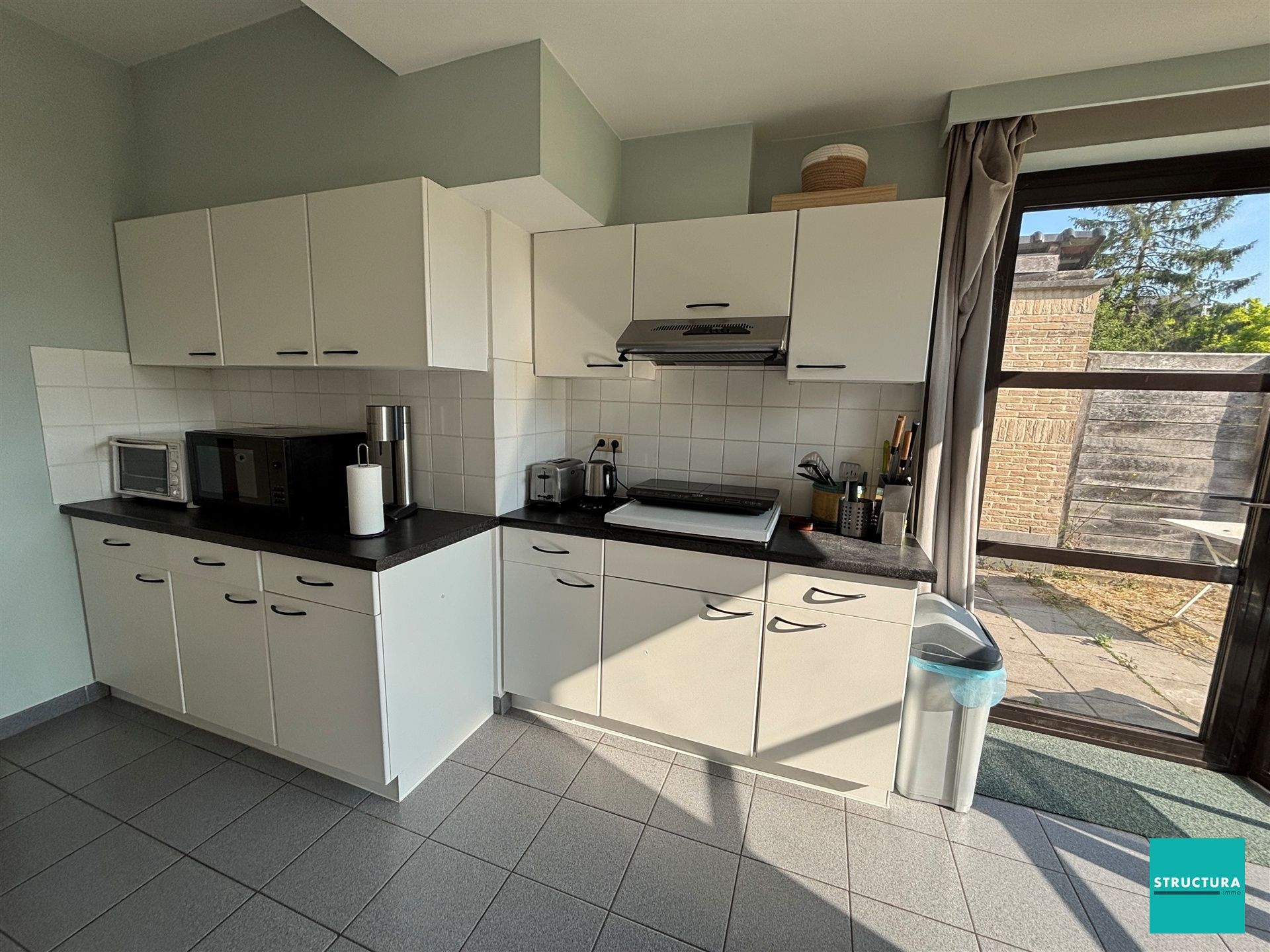 Gelijkvloers appartement met ruime tuin  foto 4