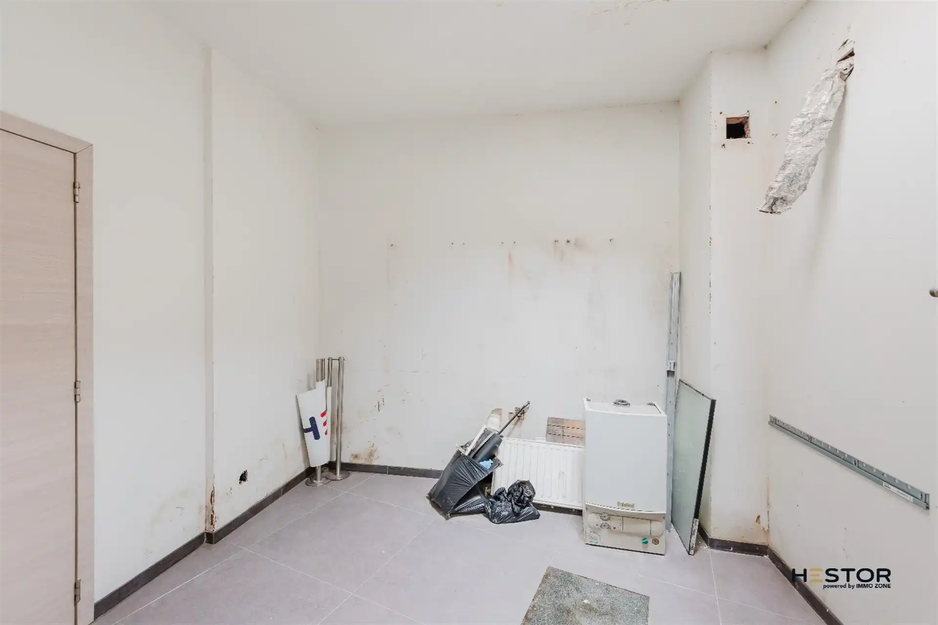 Te renoveren handelsruimte te Beveren foto 4