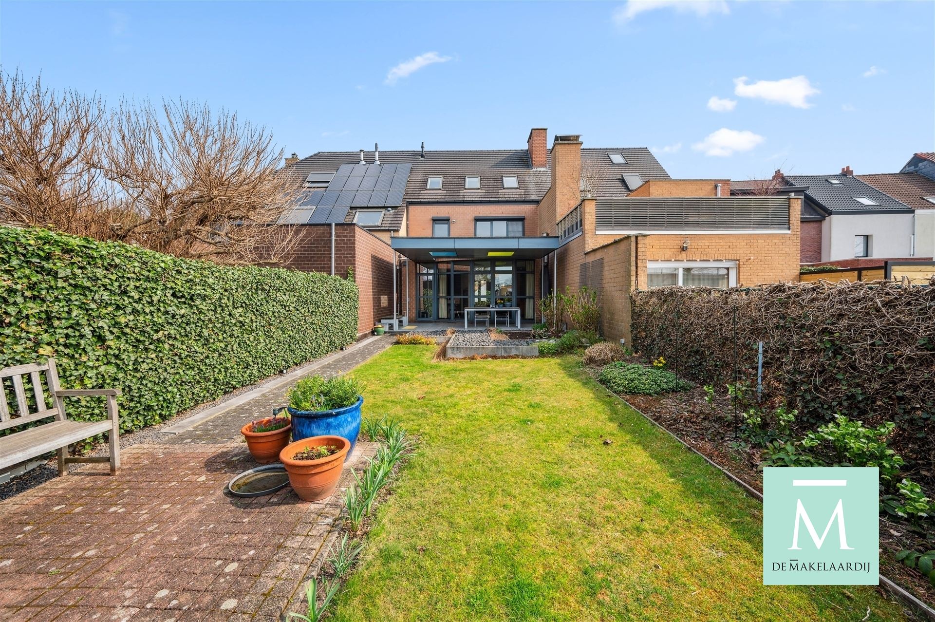 Energiezuinige woning met aangename tuin en garage foto 28