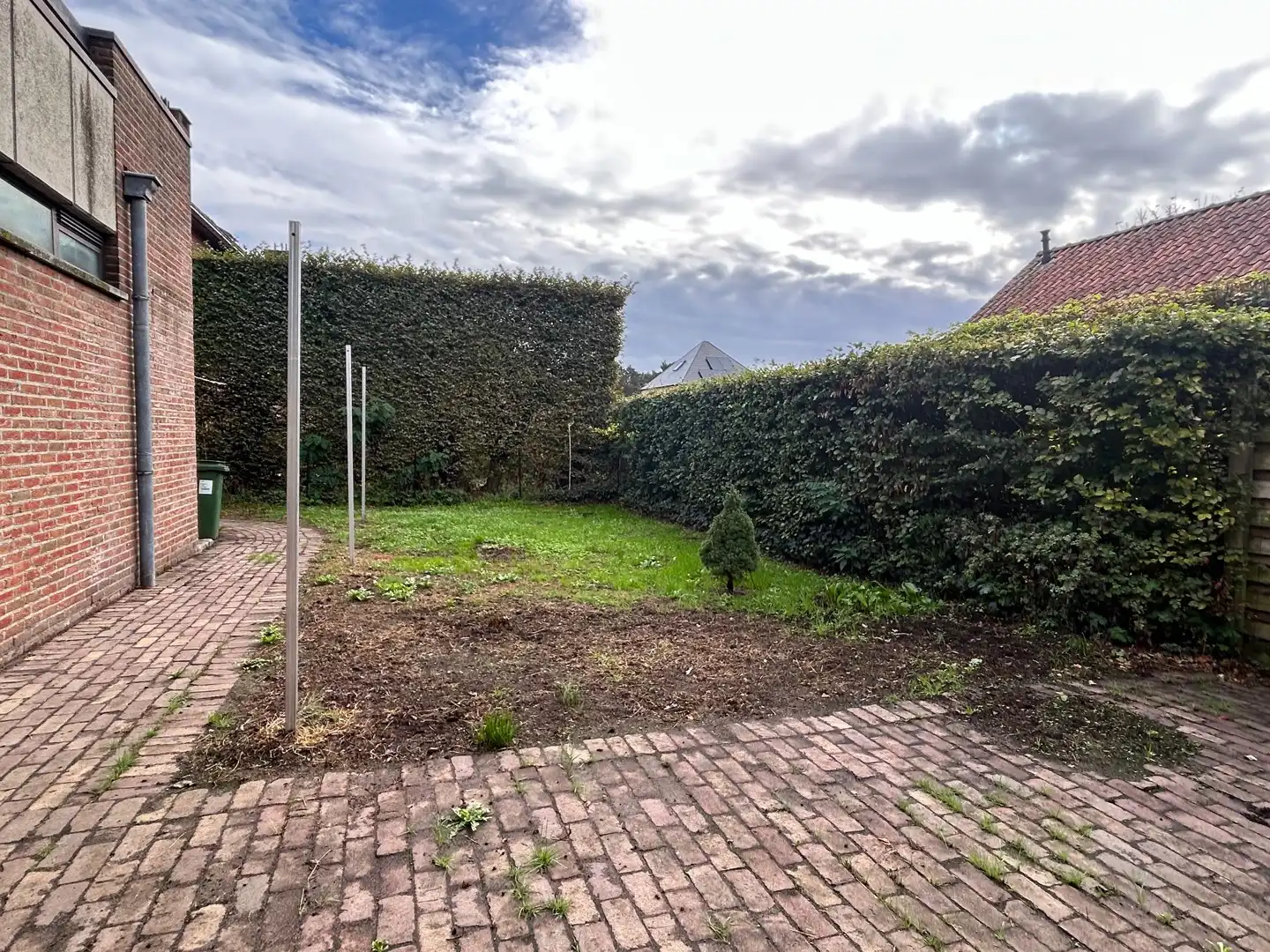 Appartement met 2 slpkmrs met terras en tuin in centrum Oevel te huur! foto 16