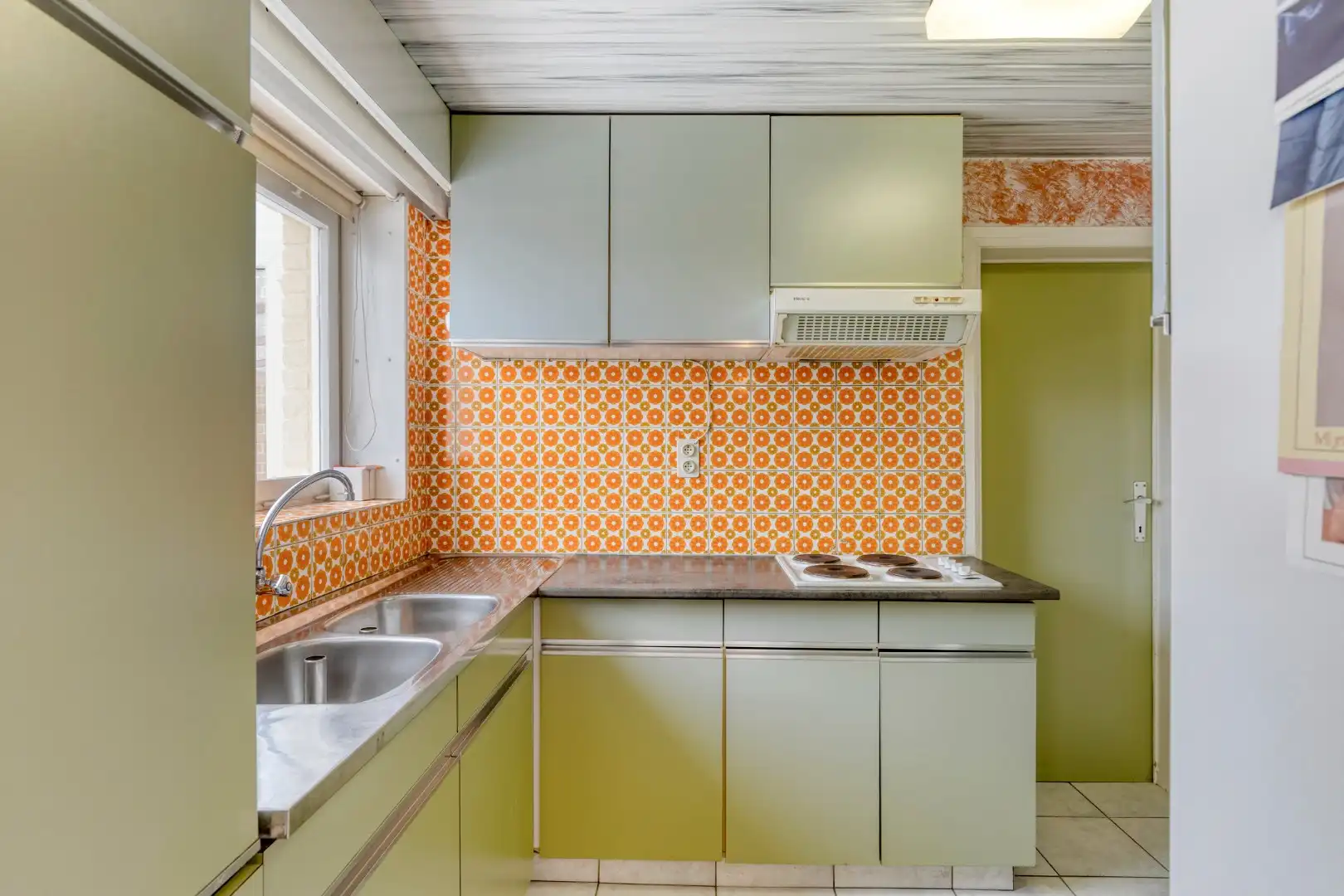 Te renoveren woning met 4 slaapkamers, garage en tuin op rustige ligging! foto 4