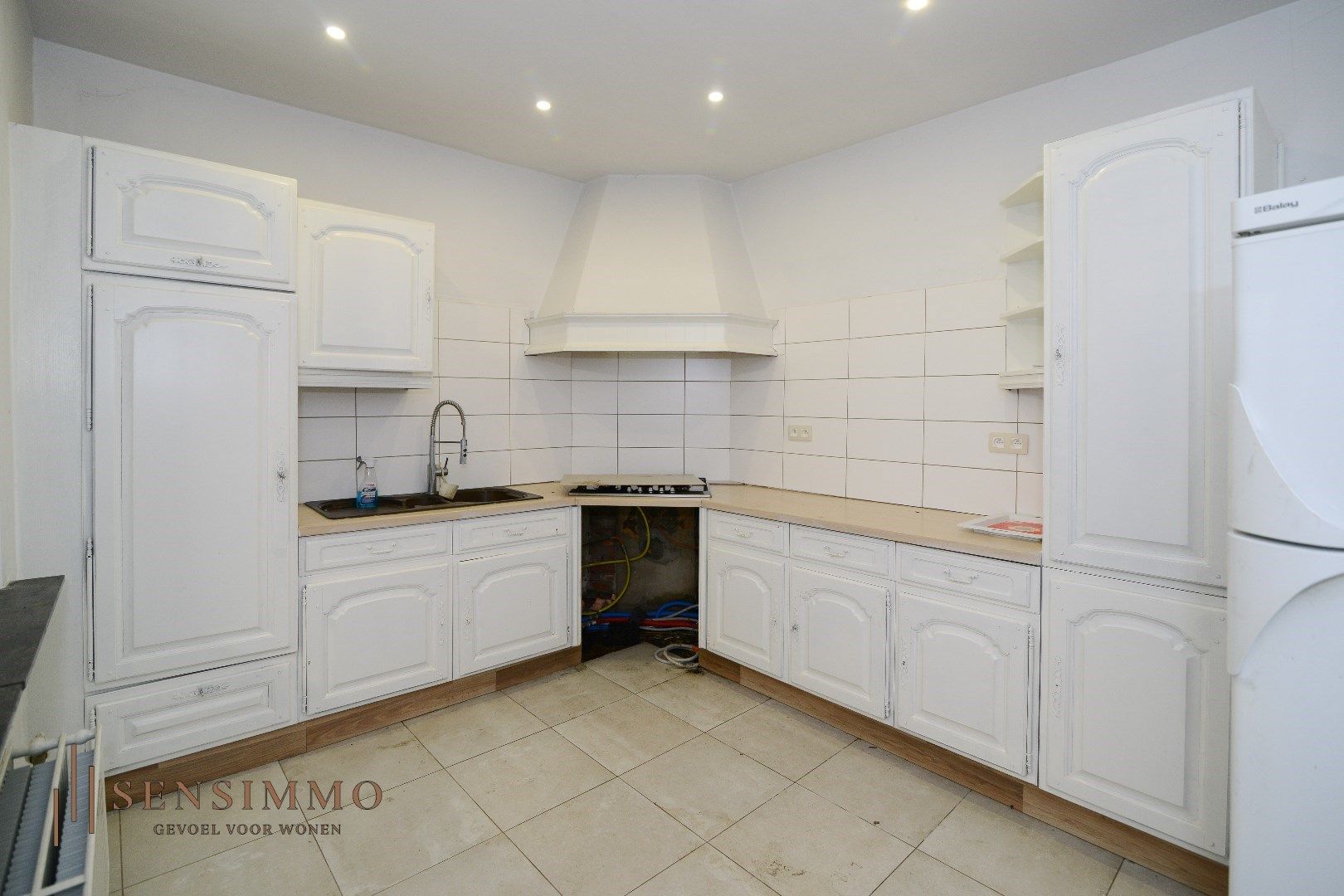Halfopen bebouwing met potentieel op toplocatie in Leopoldsburg! foto 9