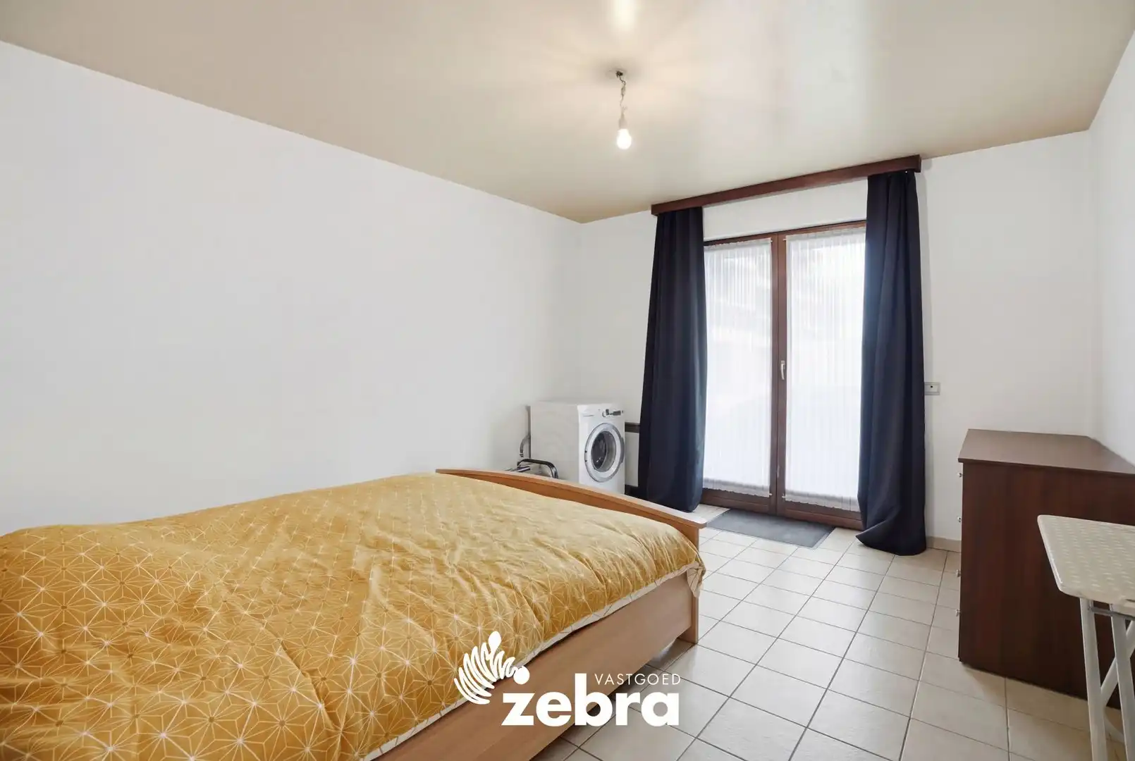 Gelijkvloers 2-slaapkamerappartement met terras en garage in centrum Tielt! foto 13