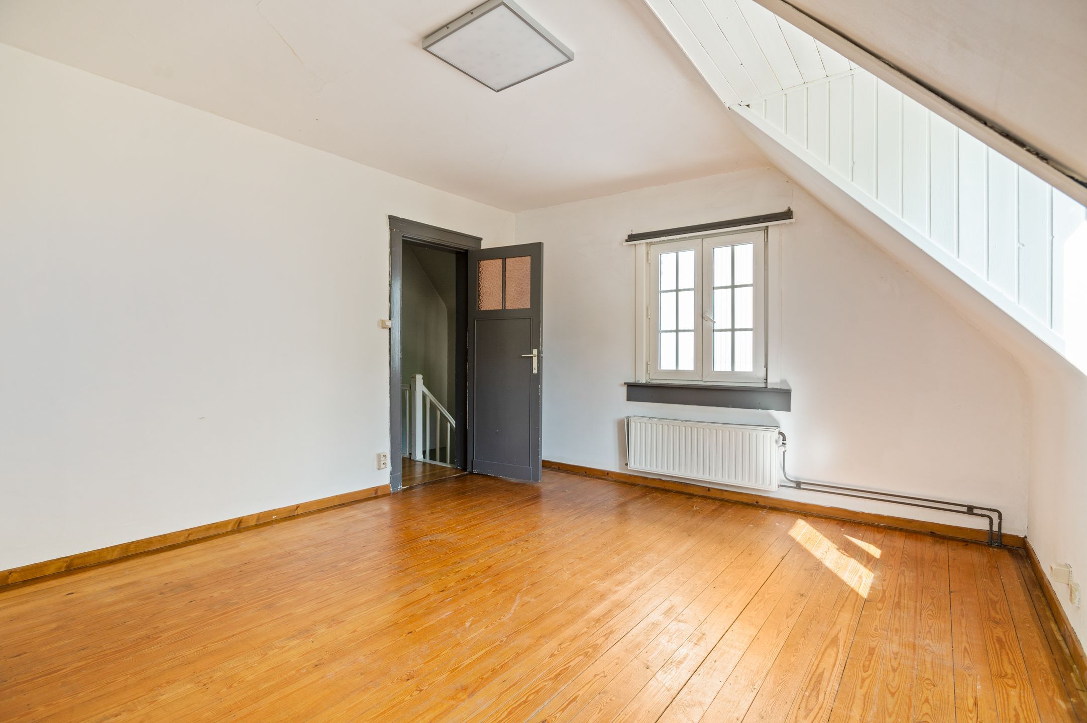 Halfopen woning met 2 slaapkamers en een grote tuin in Brasschaat te huur! foto 14