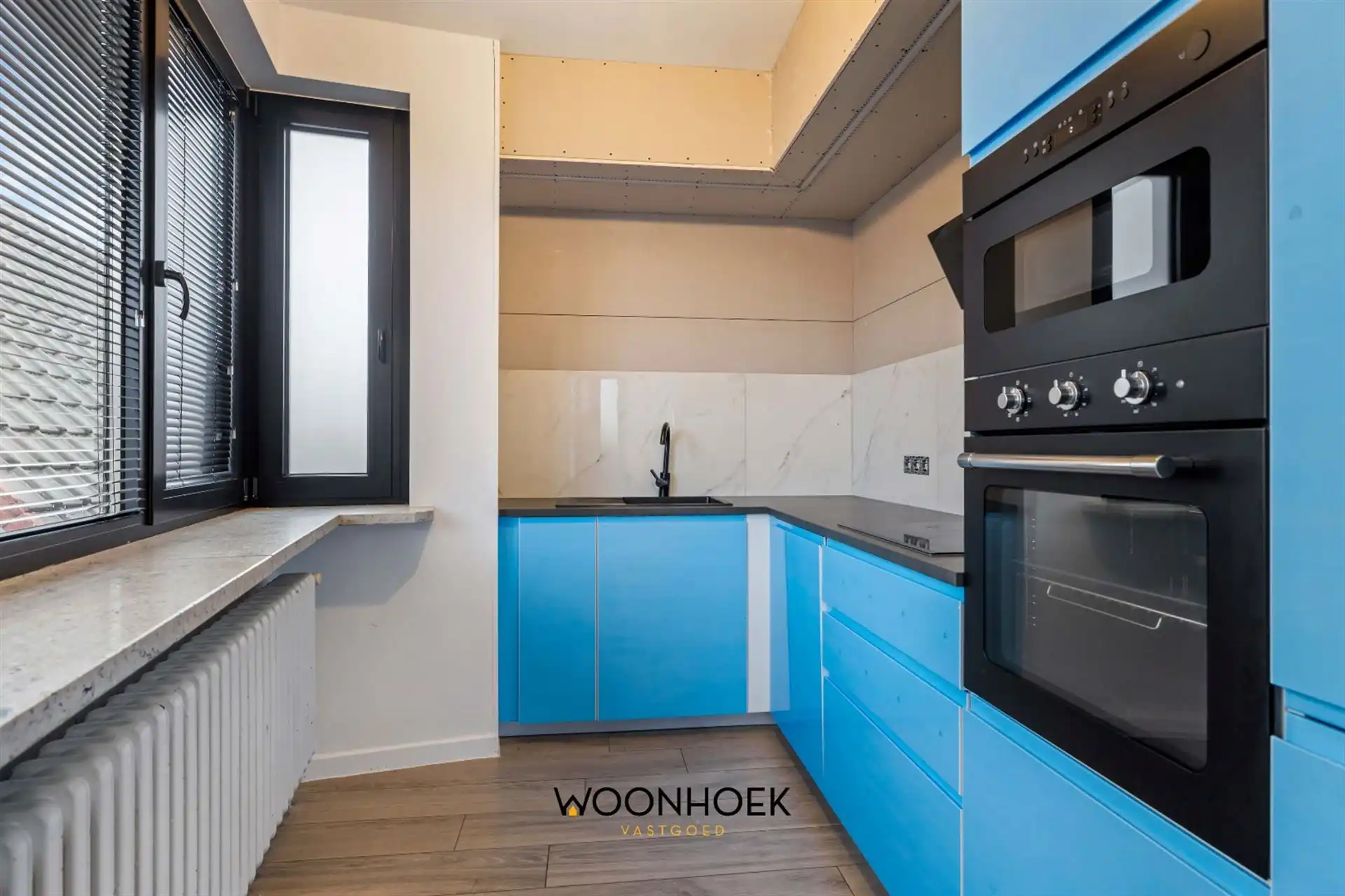 Stategisch gelegen 2-slpk appartement in centrum foto 8