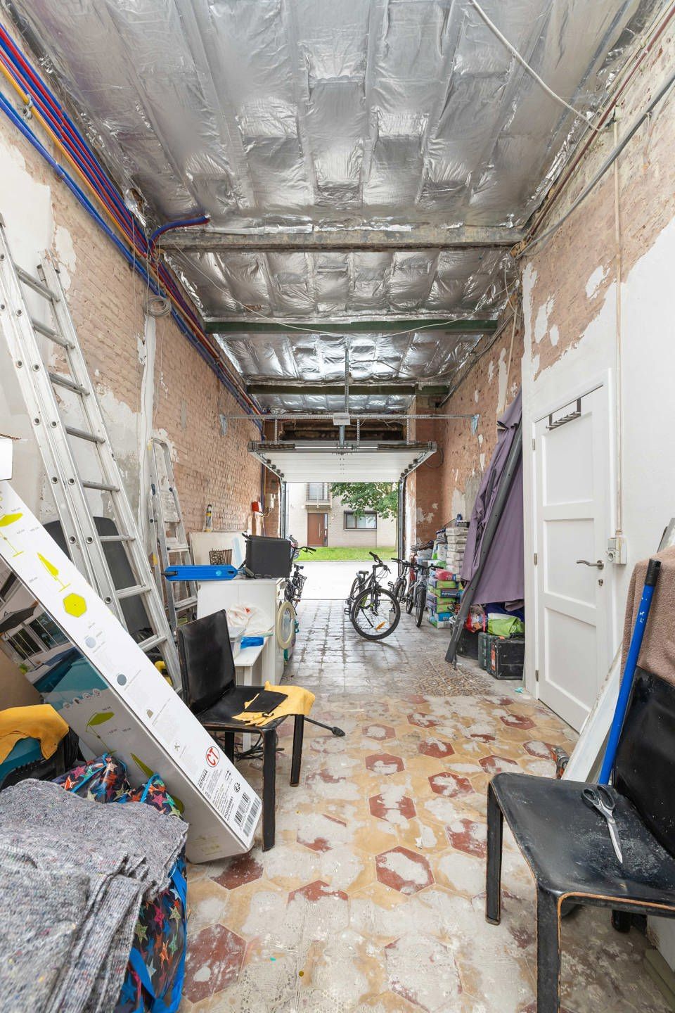 Woning van ± 150 m² met atelier/opslagruimte van ± 100 m² foto 18