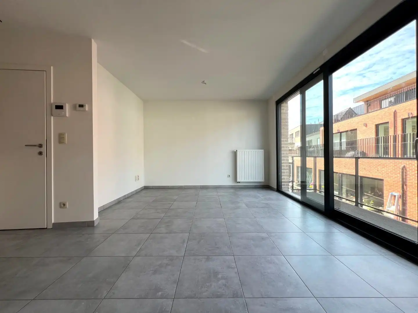 Appartement te Diest : slaapkamer en terras foto 3