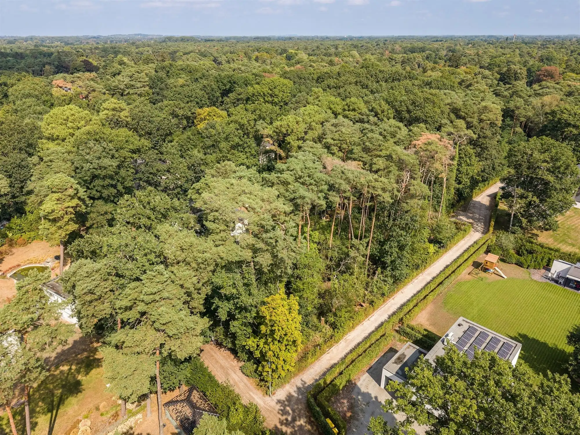 Bouwgrond van 1.555 m² in groene omgeving nabij het dorpshart foto 7