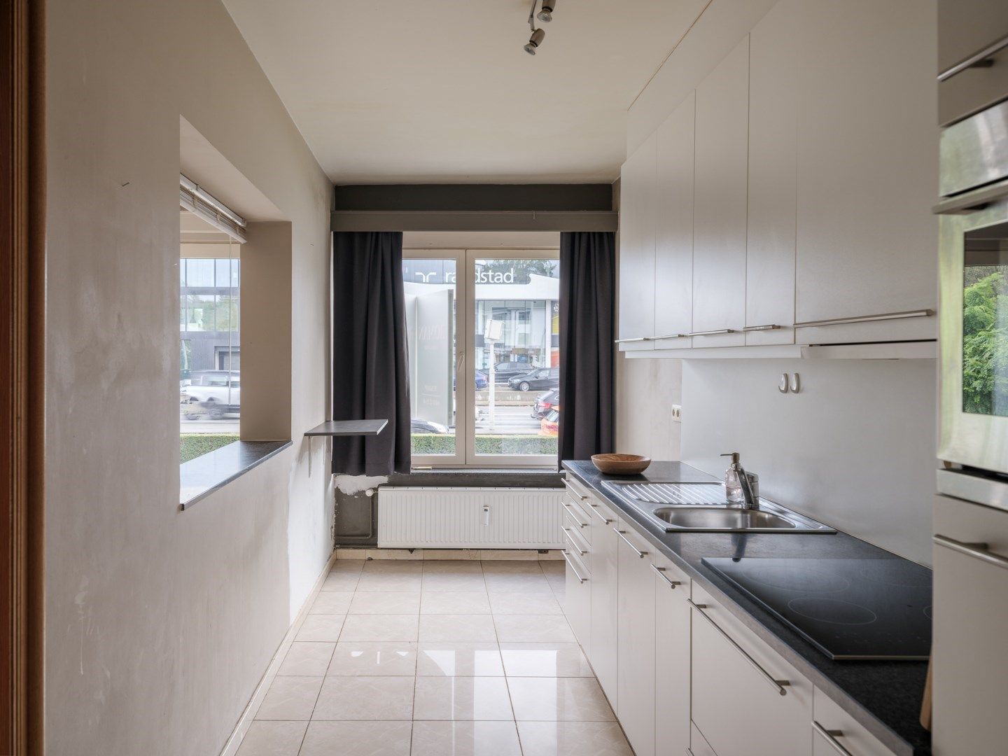 Instapklaar appartement met praktijkmogelijkheid en terras met tuinzicht foto 6