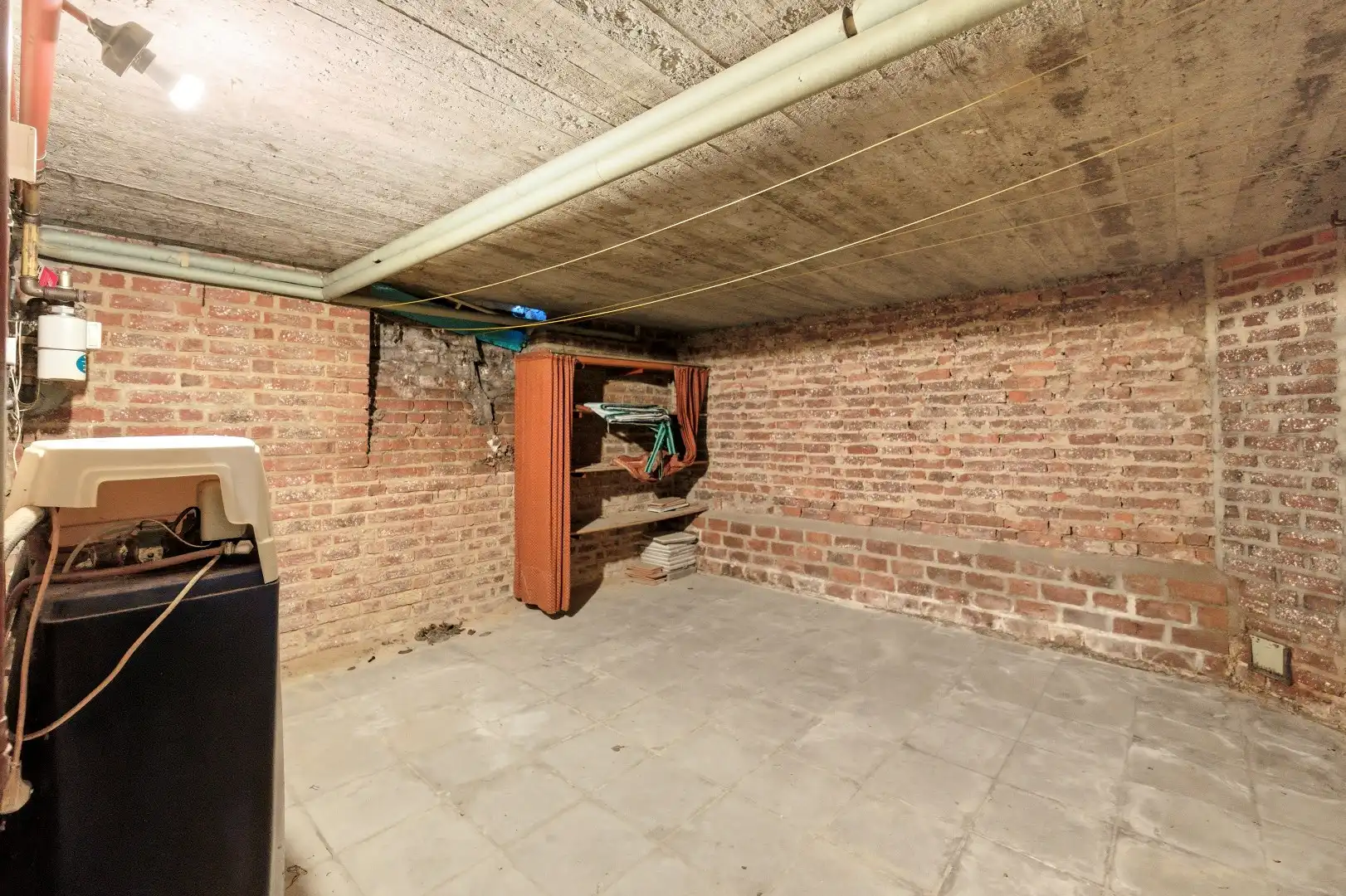 Op te frissen rijwoning met 2 slaapkamers en ruime tuin in Tienen foto 18