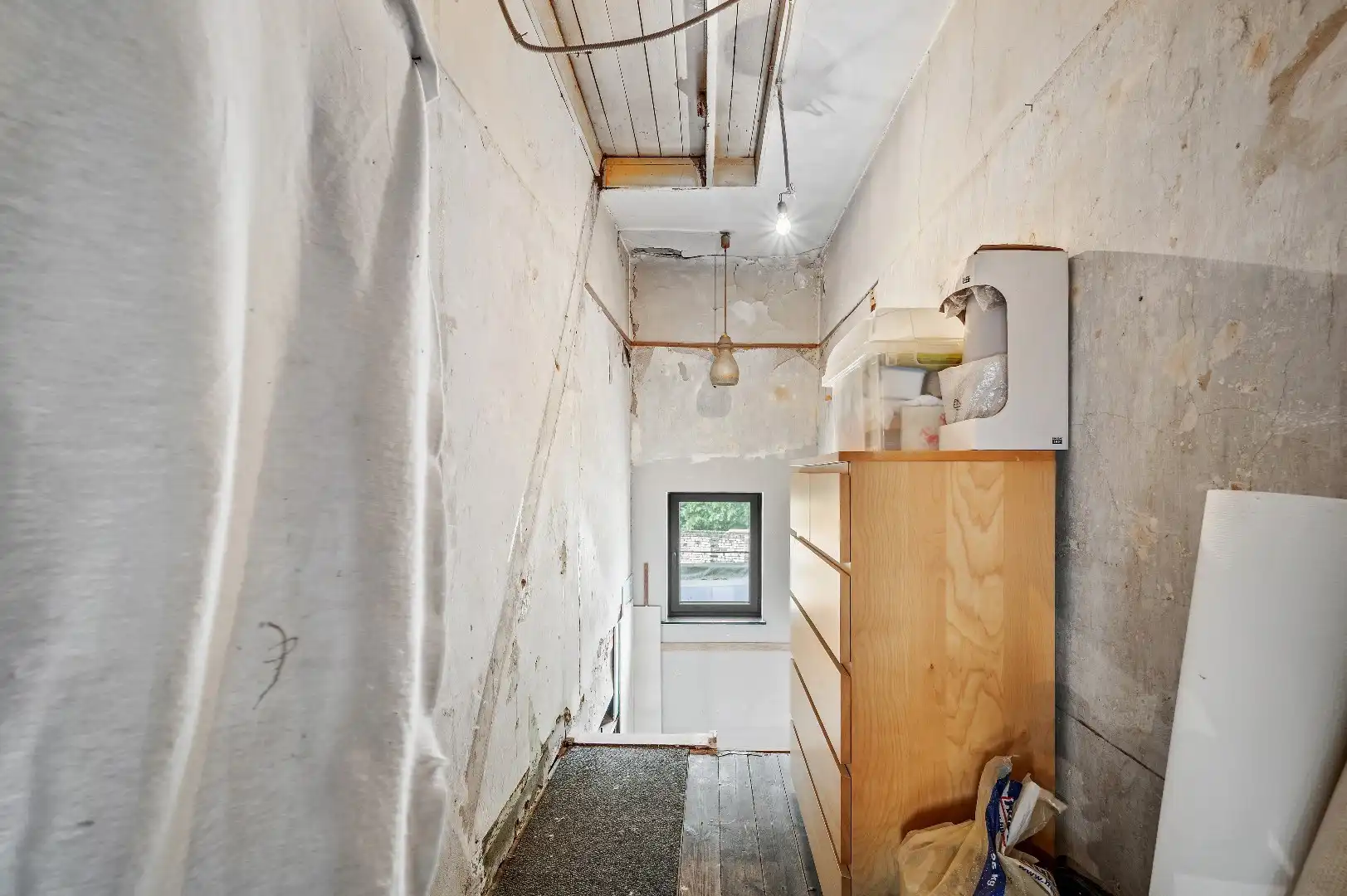 Af te werken rijwoning op de Tiense stadsrand foto 12