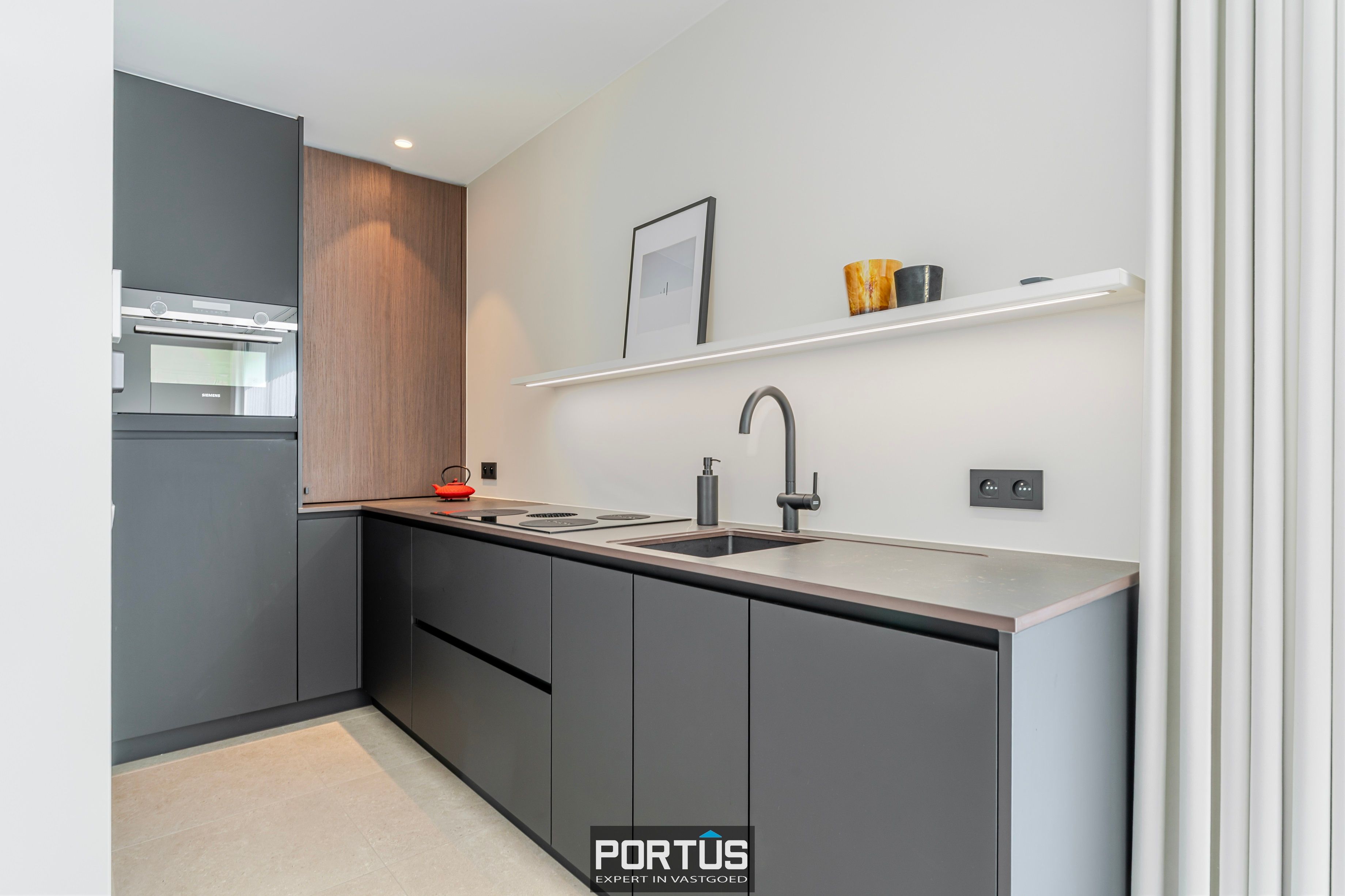 Recent instapklaar gelijkvloers appartement met 2 slaapkamers te koop foto 9