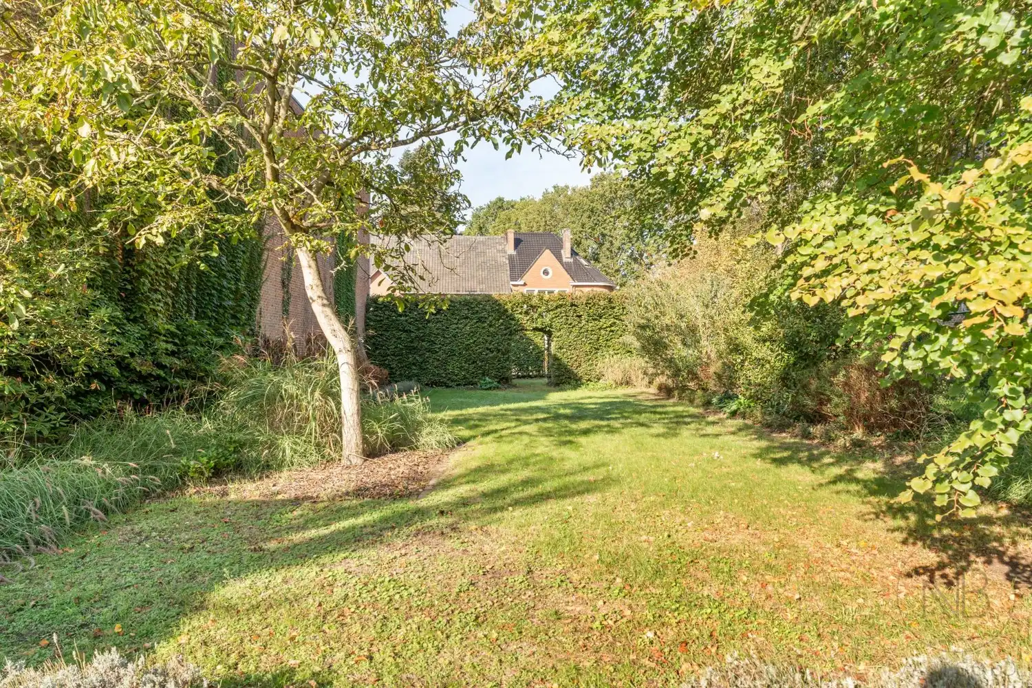 Karaktervolle woning met authentieke charme en lichtrijke tuinkamer! foto 6