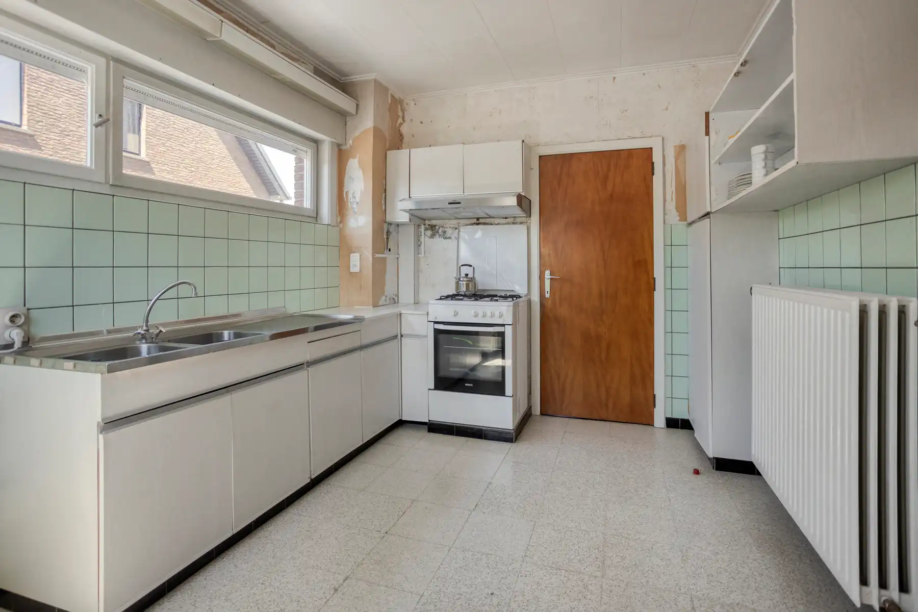 Te renoveren open bebouwing met zuidgerichte tuin foto 8