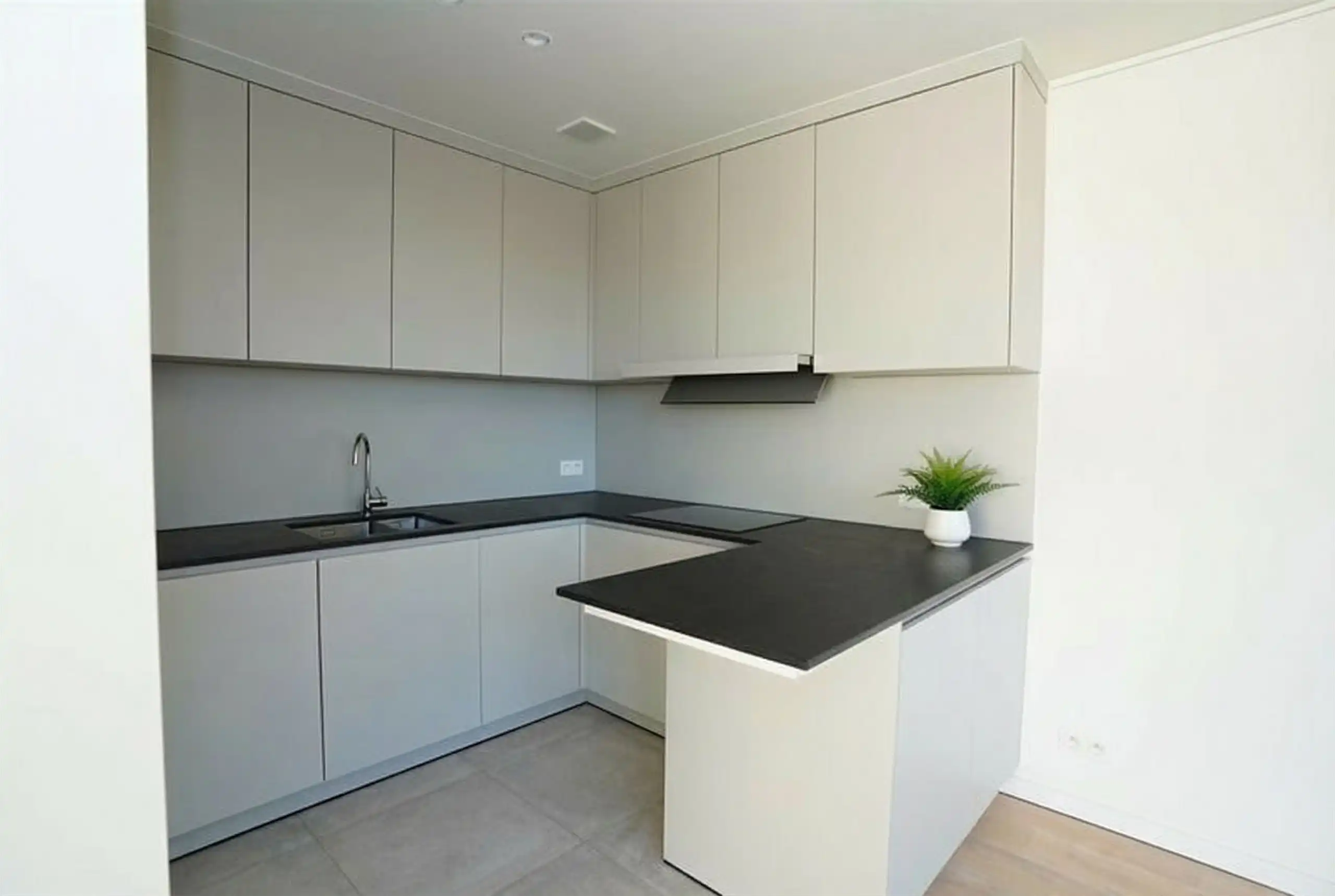 Jong dakappartement met zicht op nieuw Marktplein + garage foto 5