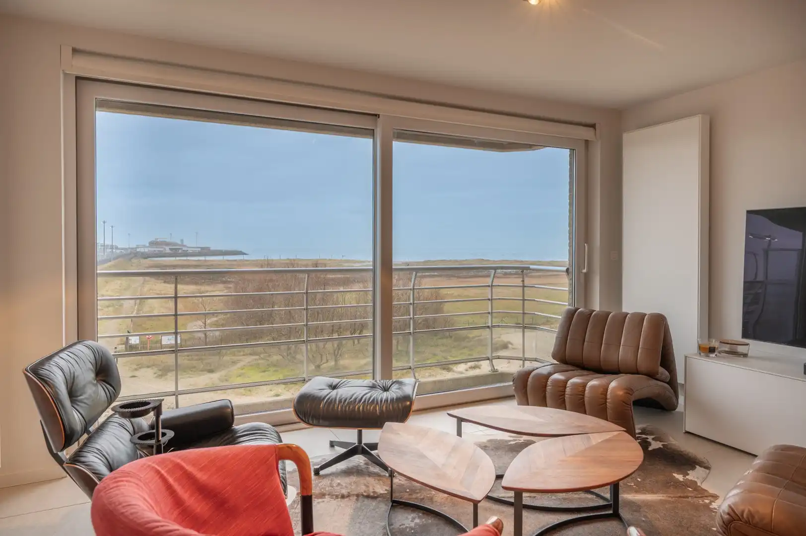 Designappartement met panoramisch zeezicht! foto 2