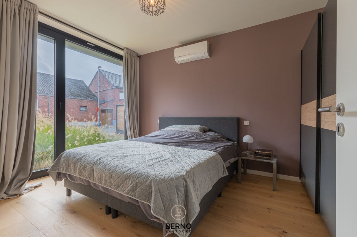 Recent gelijkvloers appartement met zonnig terras en tuintje in Opstal foto 10