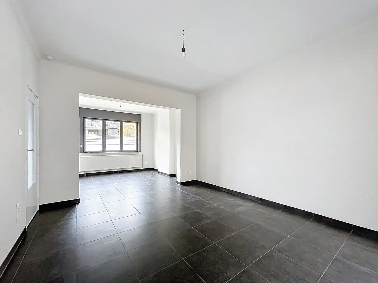 Rijwoning met 3 slpks en koer nabij het centrum foto 8