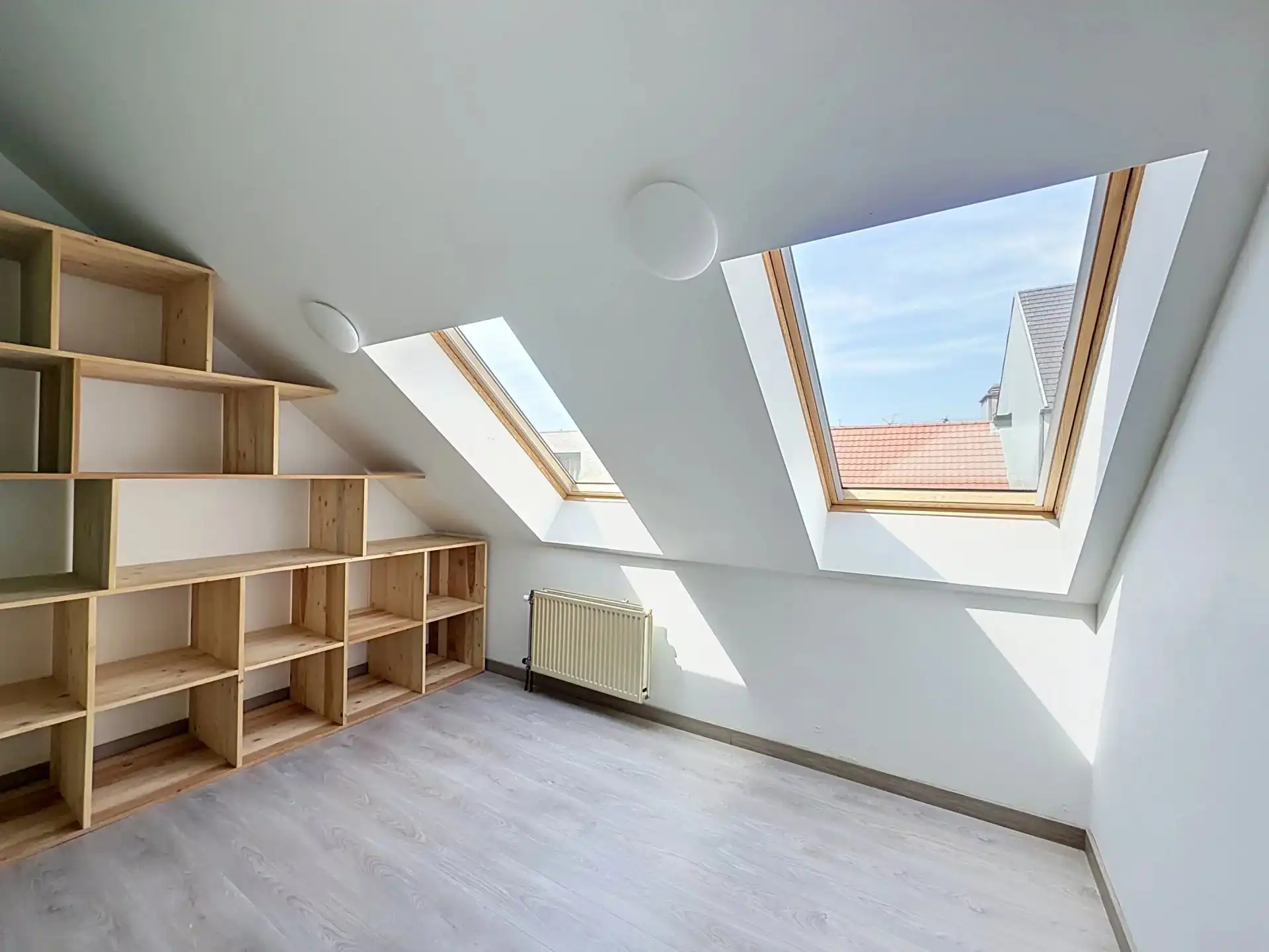 Gezellig dakappartement met 2 slaapkamers en airco foto 8