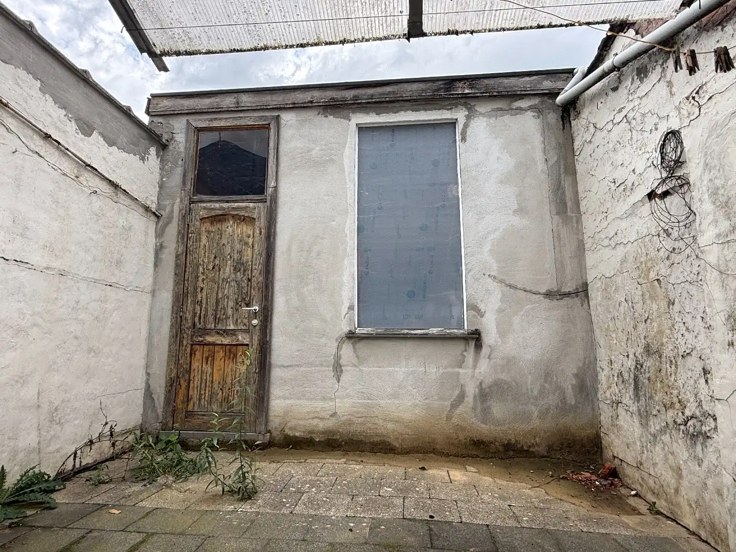 Te renoveren stadswoning met 4 slpk, koer en garage foto 22
