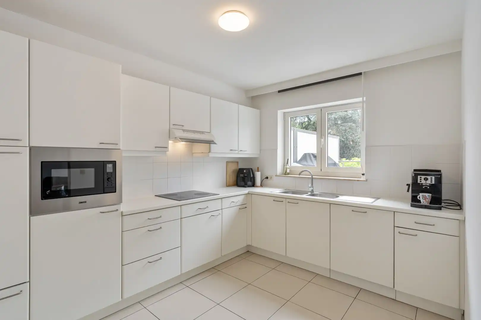 Te koop: Lichtrijk en goed onderhouden 2-slaapkamerappartement met ruim terras en garage in centrum Leopoldsburg foto 5