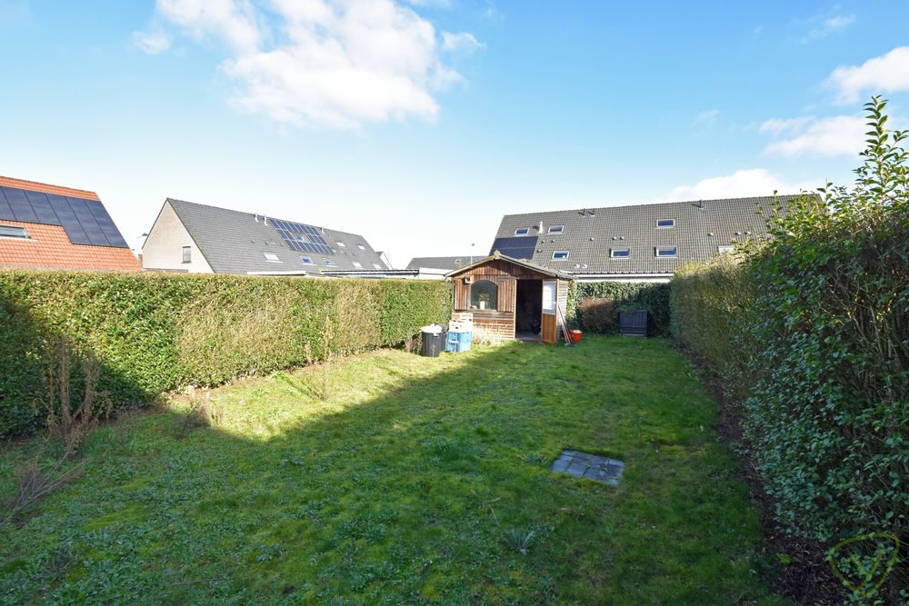 Modern afgewerkte en zeer verzorgde woning met een zonnnige tuin gelegen in een rustige woonwijk! foto 5