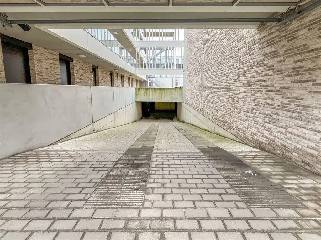 Ondergrondse staanplaats in centrum Herent! foto 5