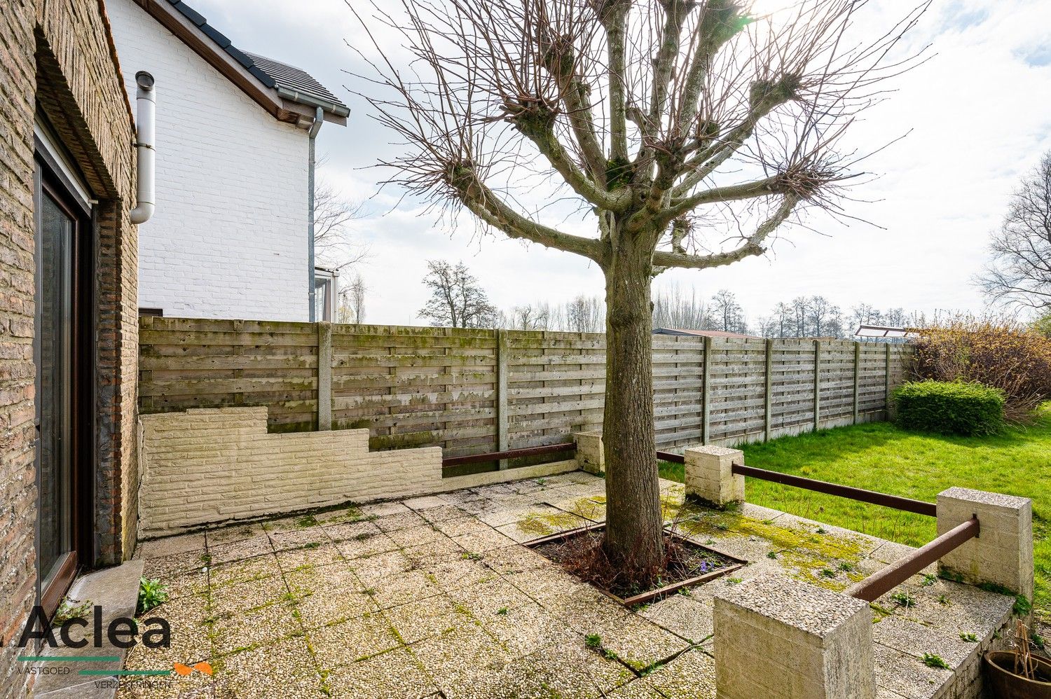 Te renoveren woning met 4/5 slpks en mooie zuid gerichte tuin foto 13