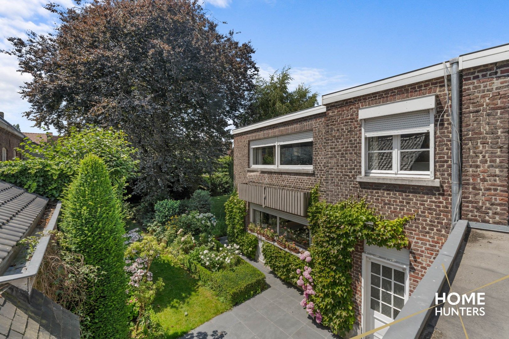 Statige herenwoning met 8 slaapkamers, ruime garage, praktijkruimte en fenomenale stadstuin foto 32