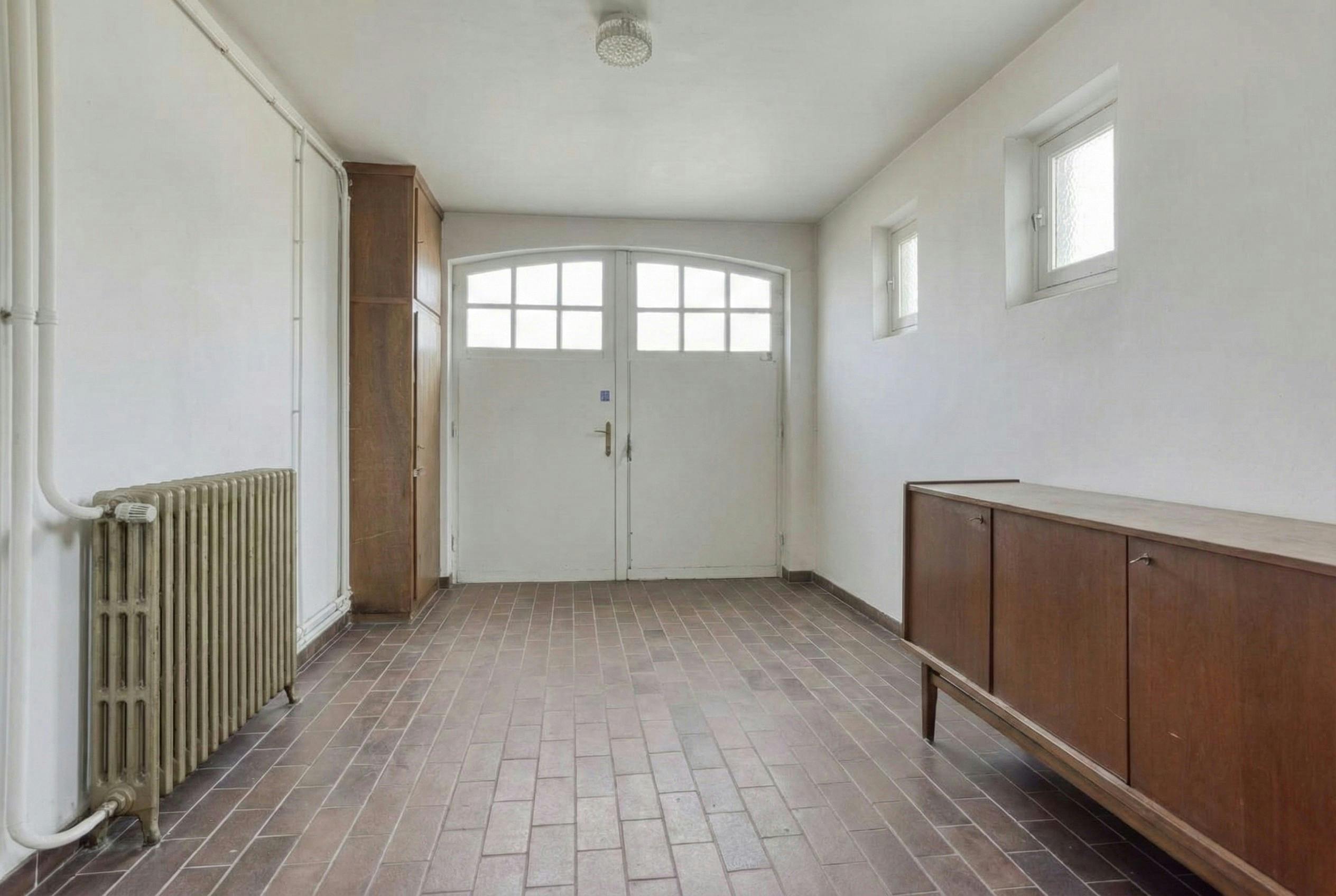 Te renoveren woning te koop net buiten het centrum van Retie foto 13
