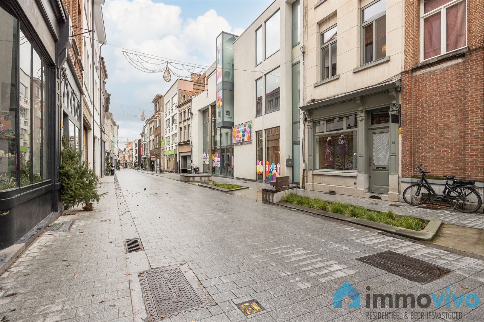 Klassevol handelspand met appartement in topwinkelstraat foto 30