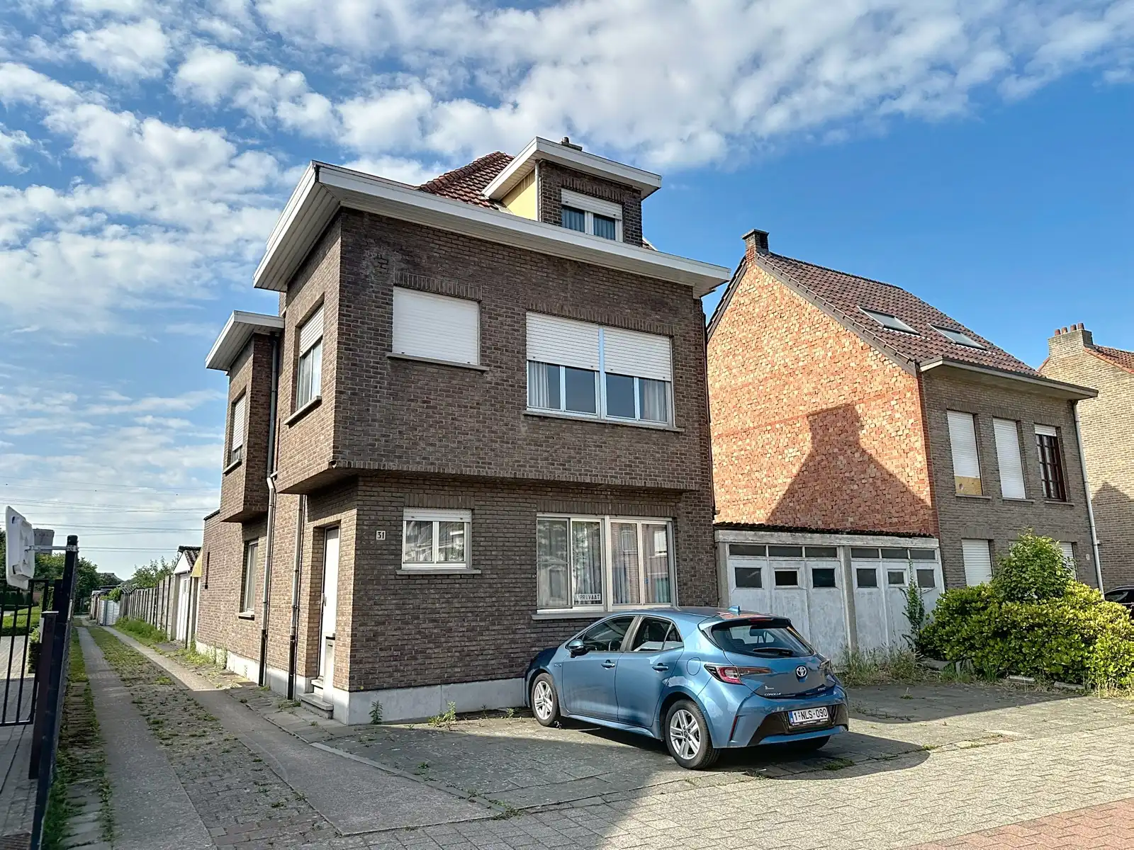 Renovatiewoning met (bouw)grond in hart van Schelle foto 2