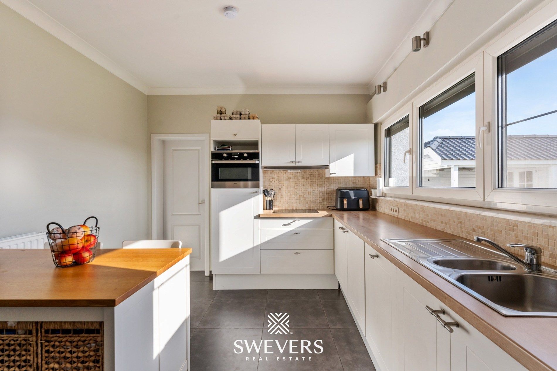 Gerenoveerde gezinswoning met 3 slpk en zonnige tuin foto 11