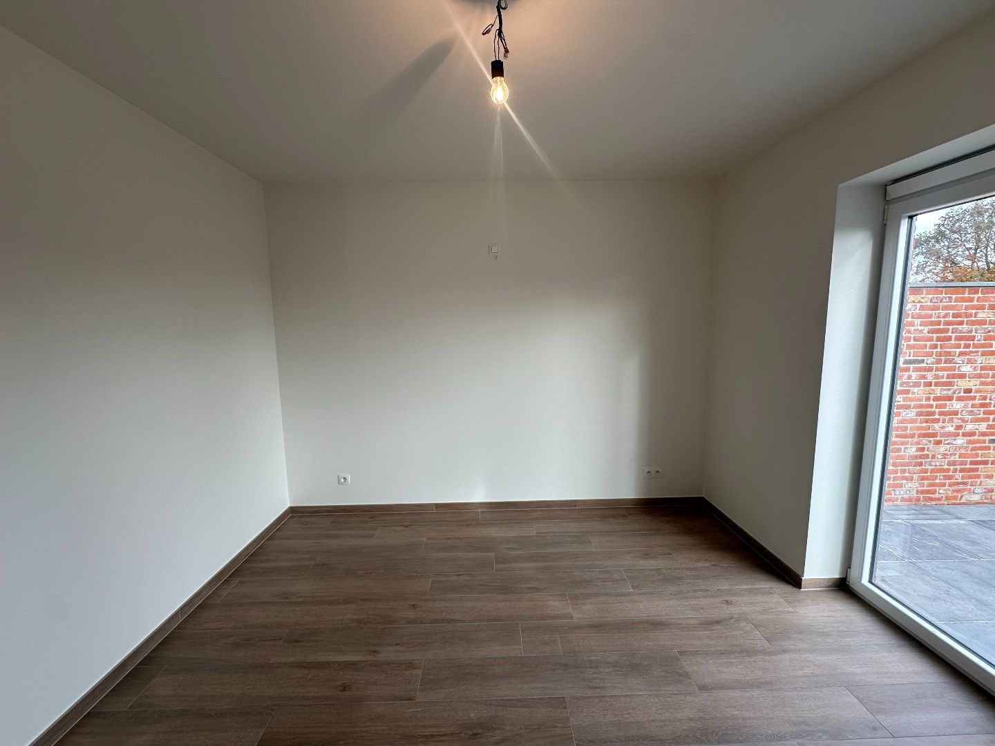 Ruim duplex-appartement met 3 slaapkamers en tuin te Werken foto 5